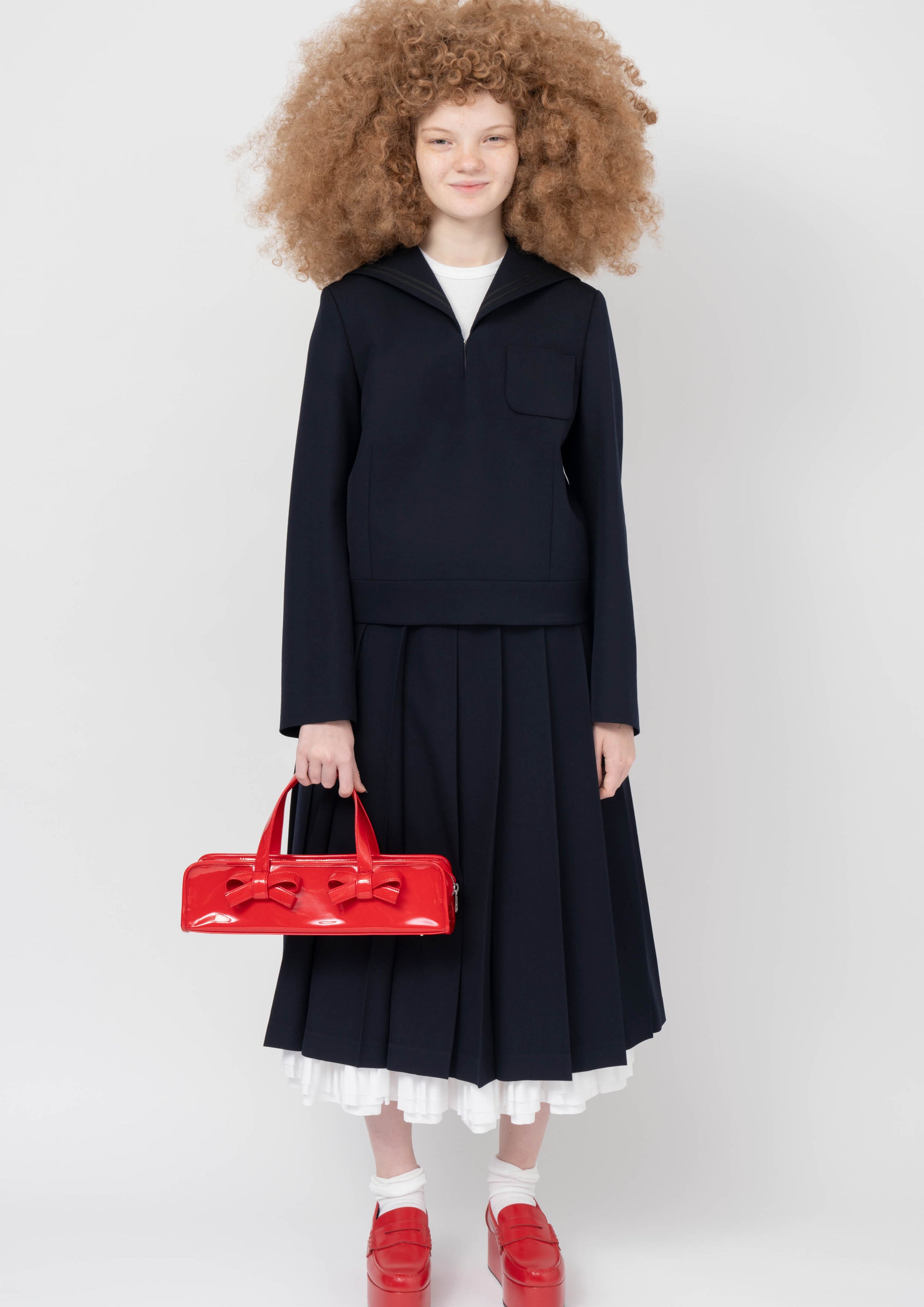Fashion model wearing a Comme des Garçons Girl SS24 outfit