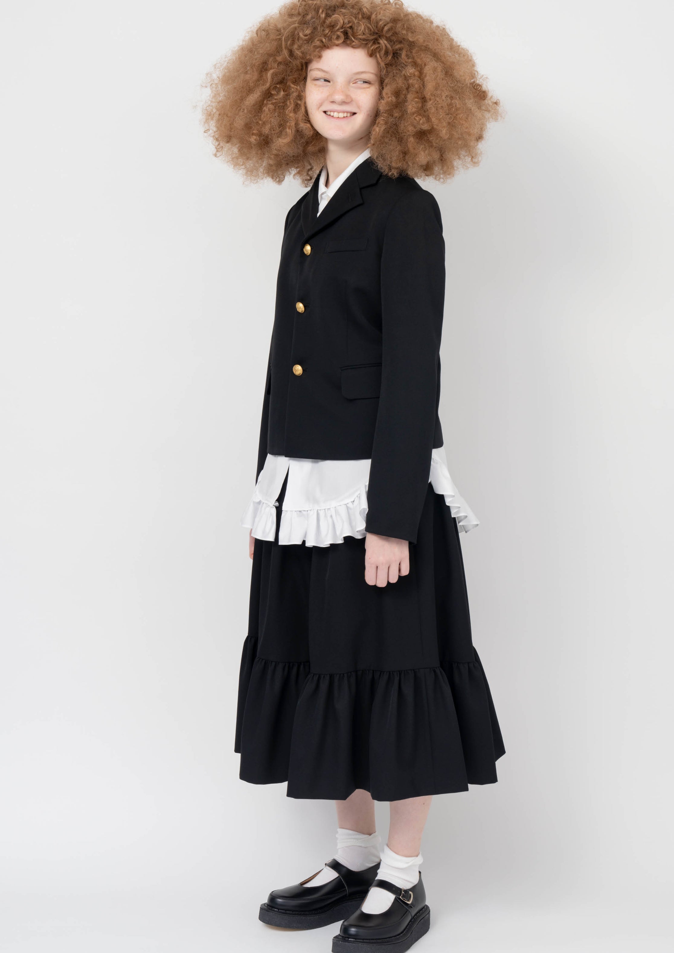 Fashion model wearing a Comme des Garçons Girl SS24 outfit