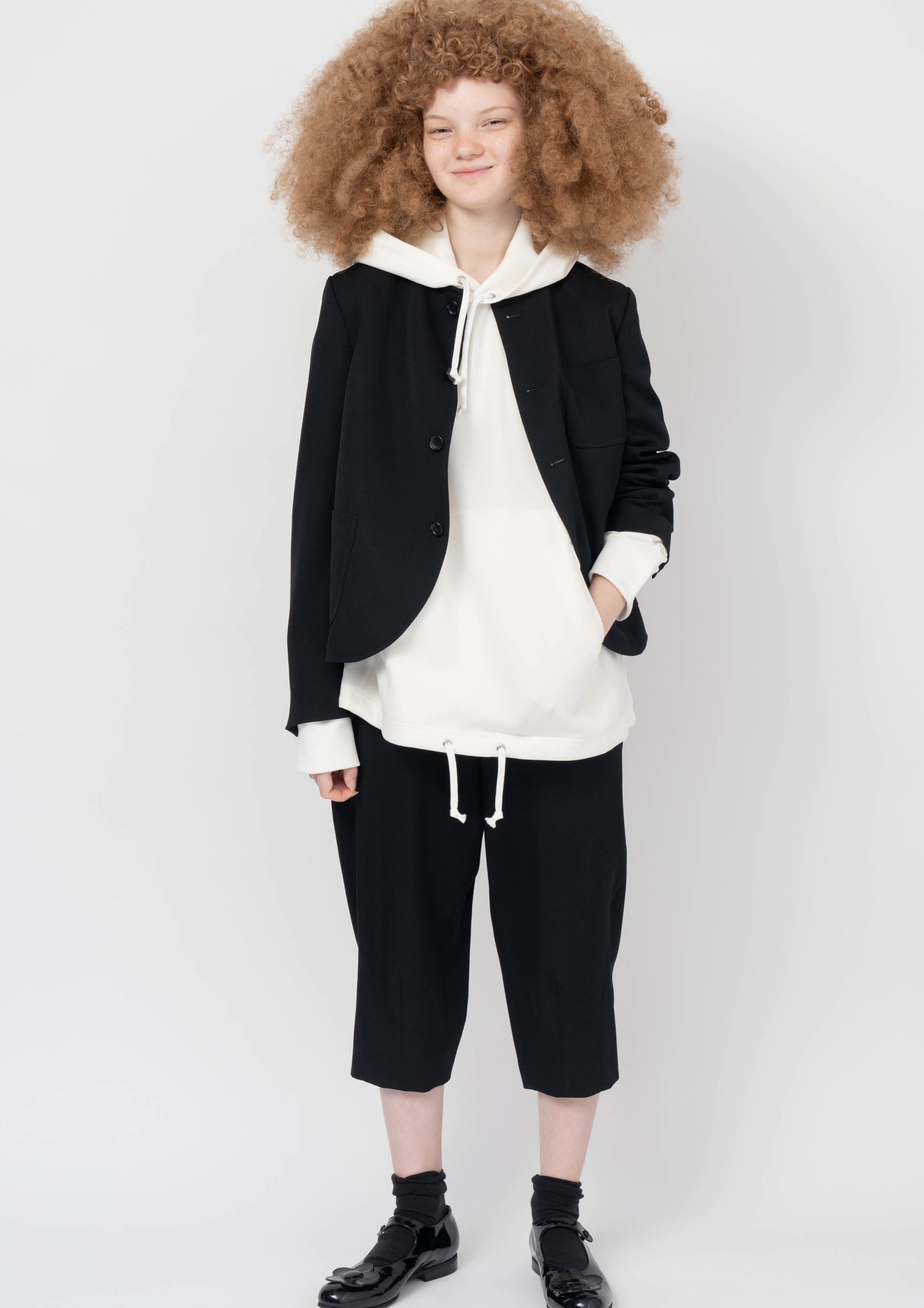 Fashion model wearing a Comme des Garçons Girl AW23 outfit