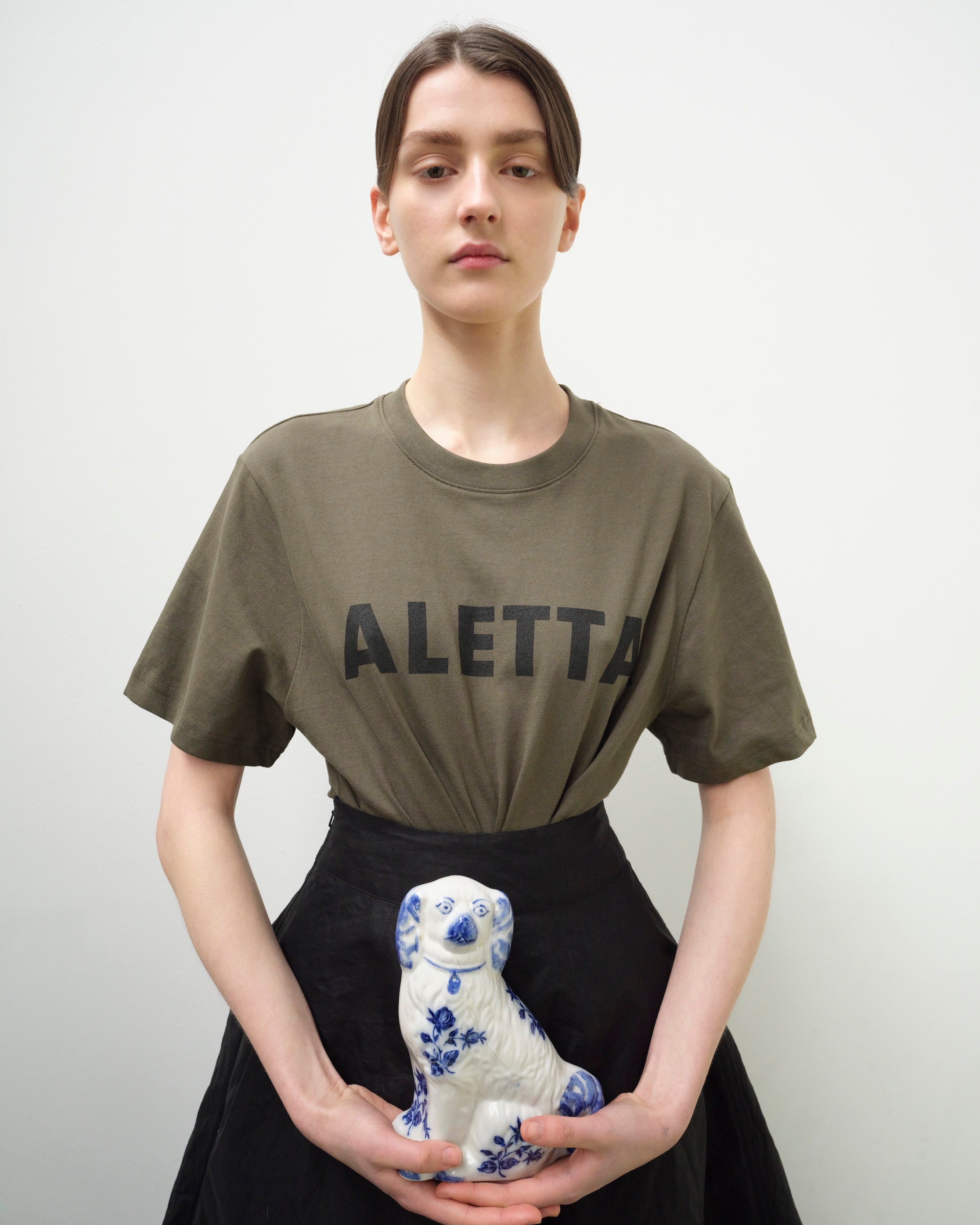 Fashion model wearing a Aletta outfit