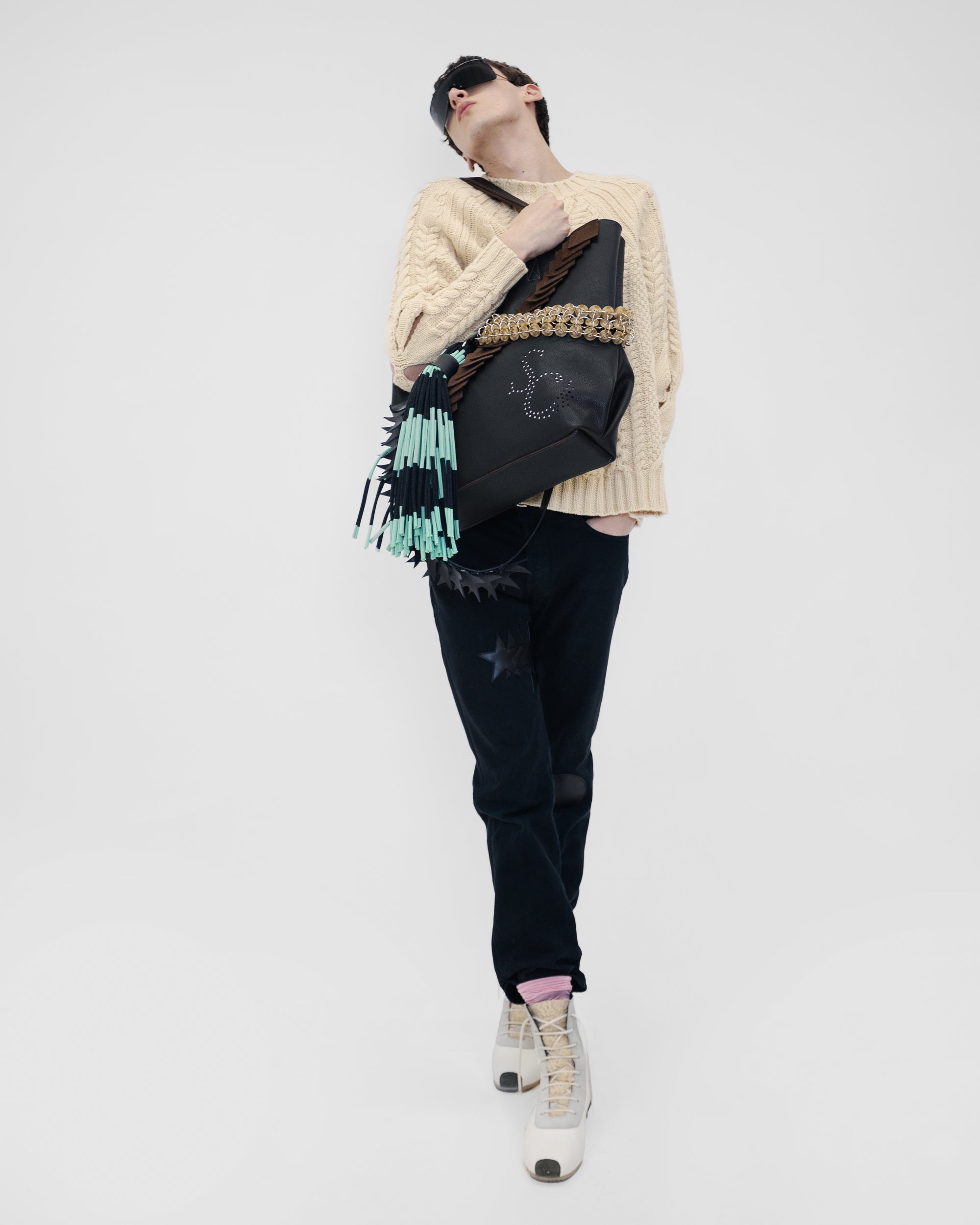Fashion model wearing a Stefan Cooke outfit