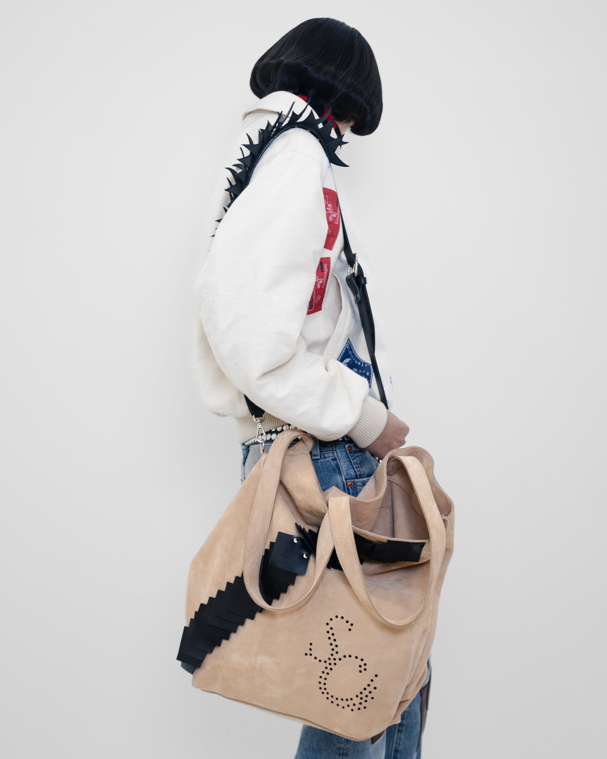 Fashion model wearing a Stefan Cooke outfit