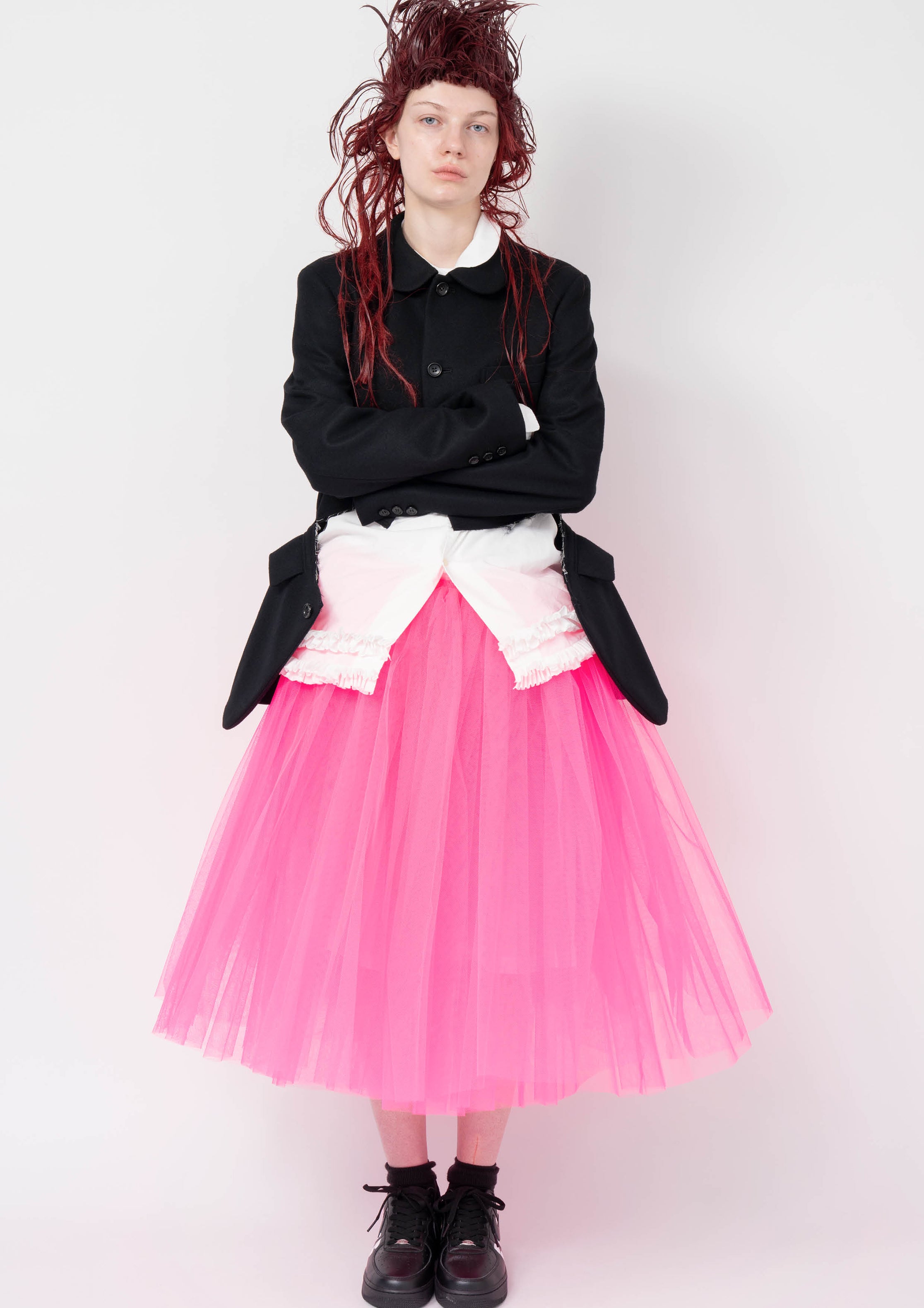 Fashion model wearing a Black Comme des Garçons AW25 outfit
