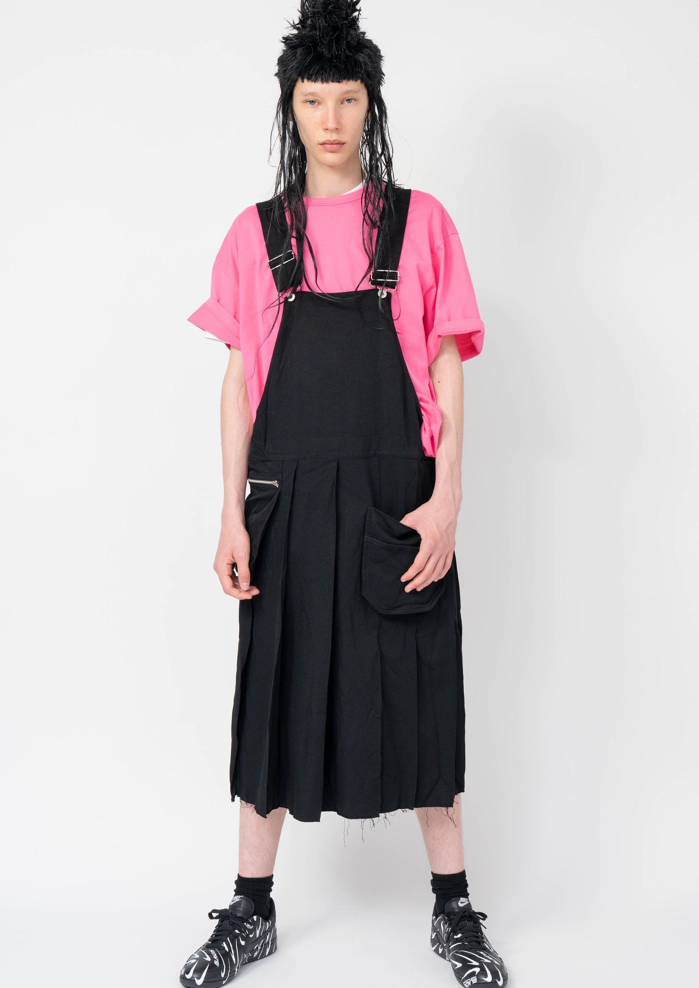 Fashion model wearing a Black Comme des Garçons AW25 outfit