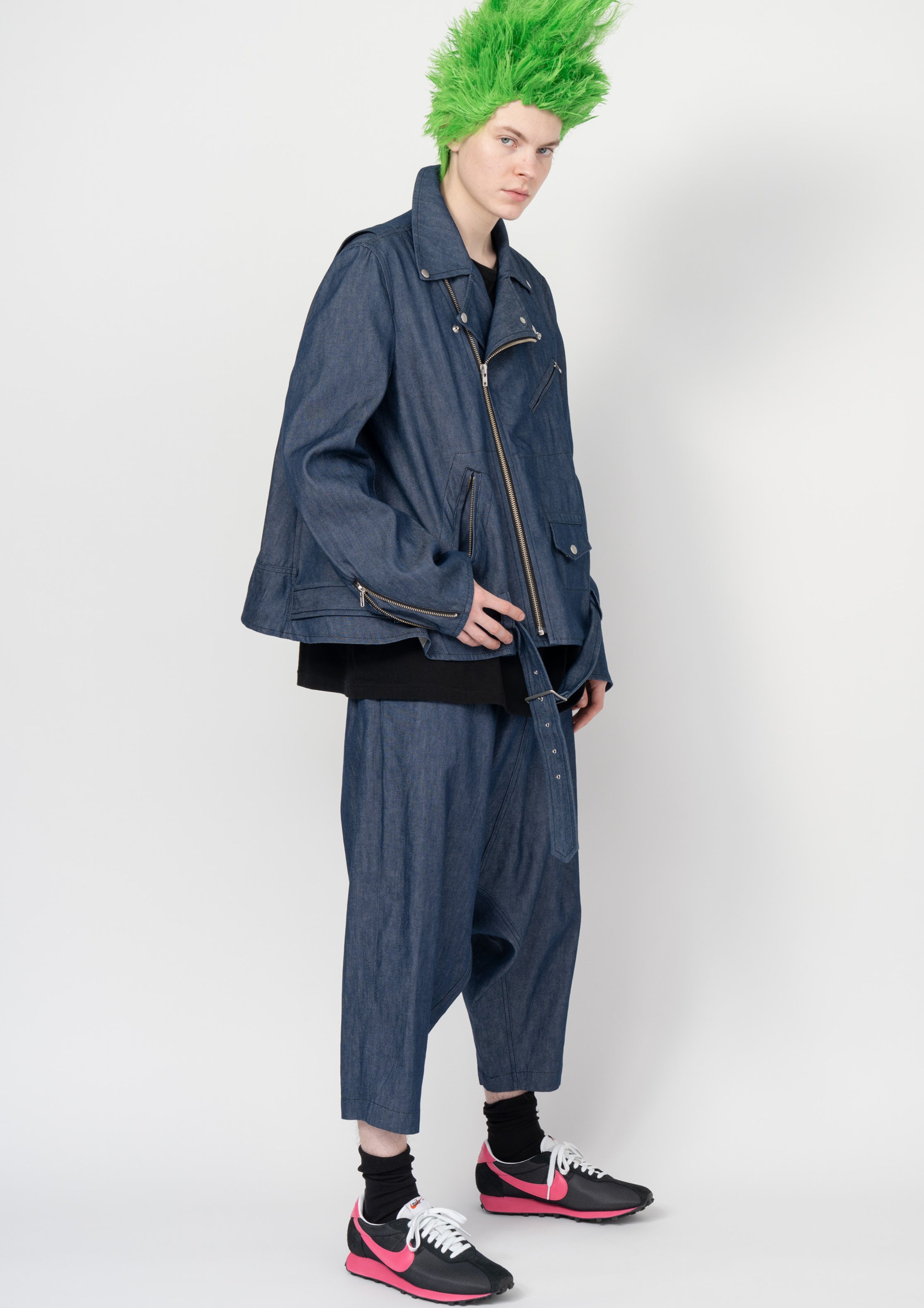 Fashion model wearing a Black Comme des Garçons SS26 outfit