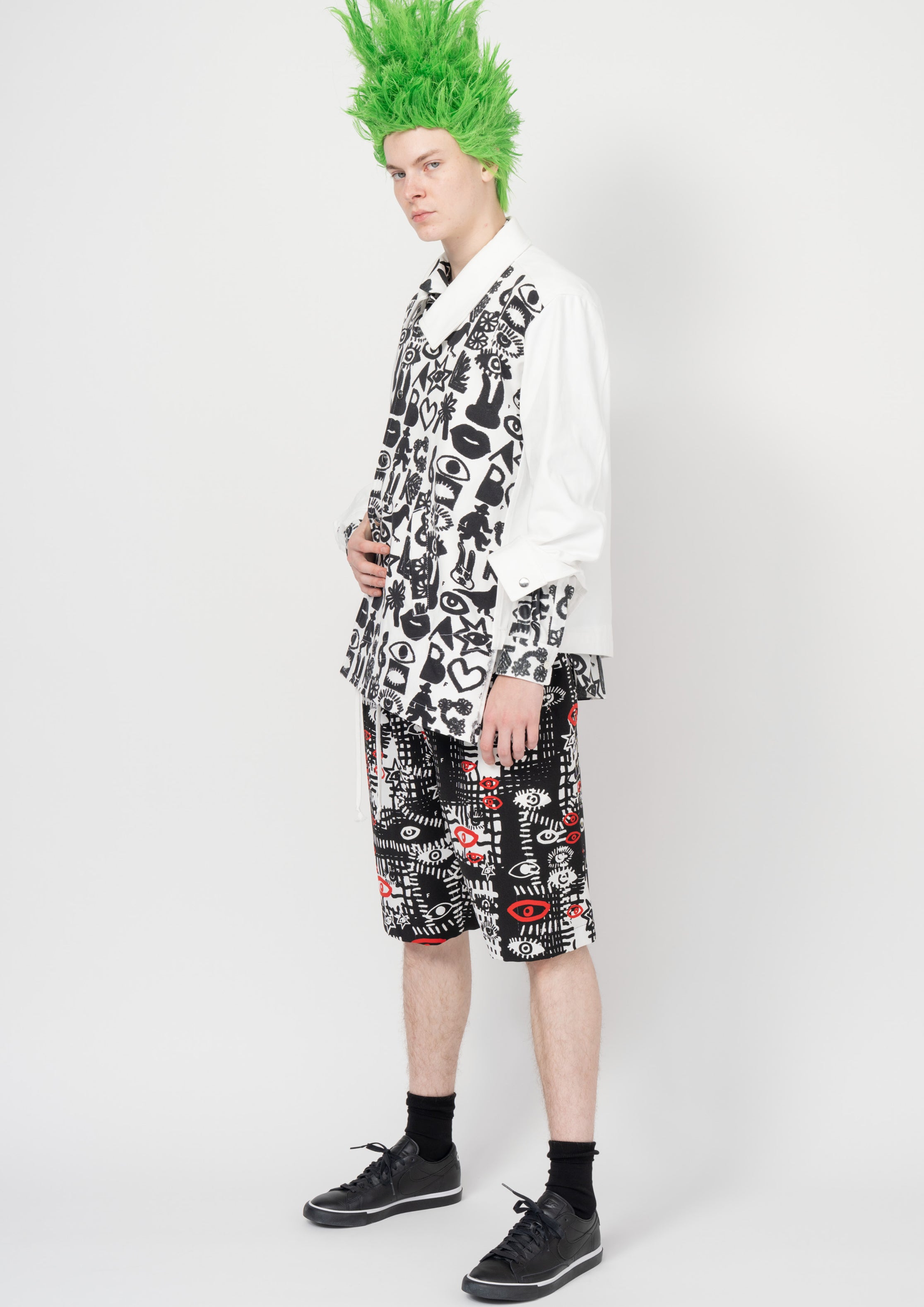 Fashion model wearing a Black Comme des Garçons SS26 outfit