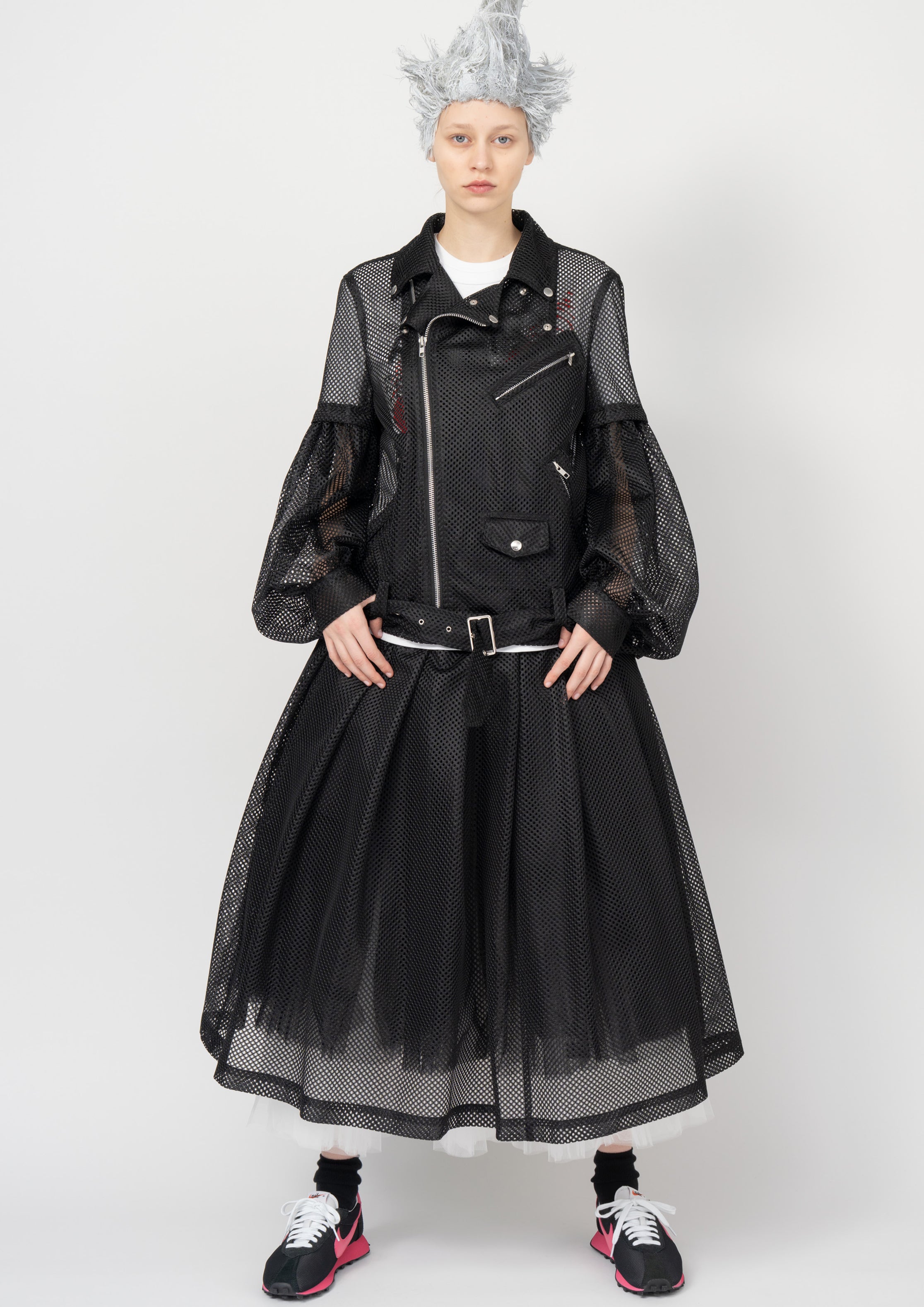 Fashion model wearing a Black Comme des Garçons SS26 outfit
