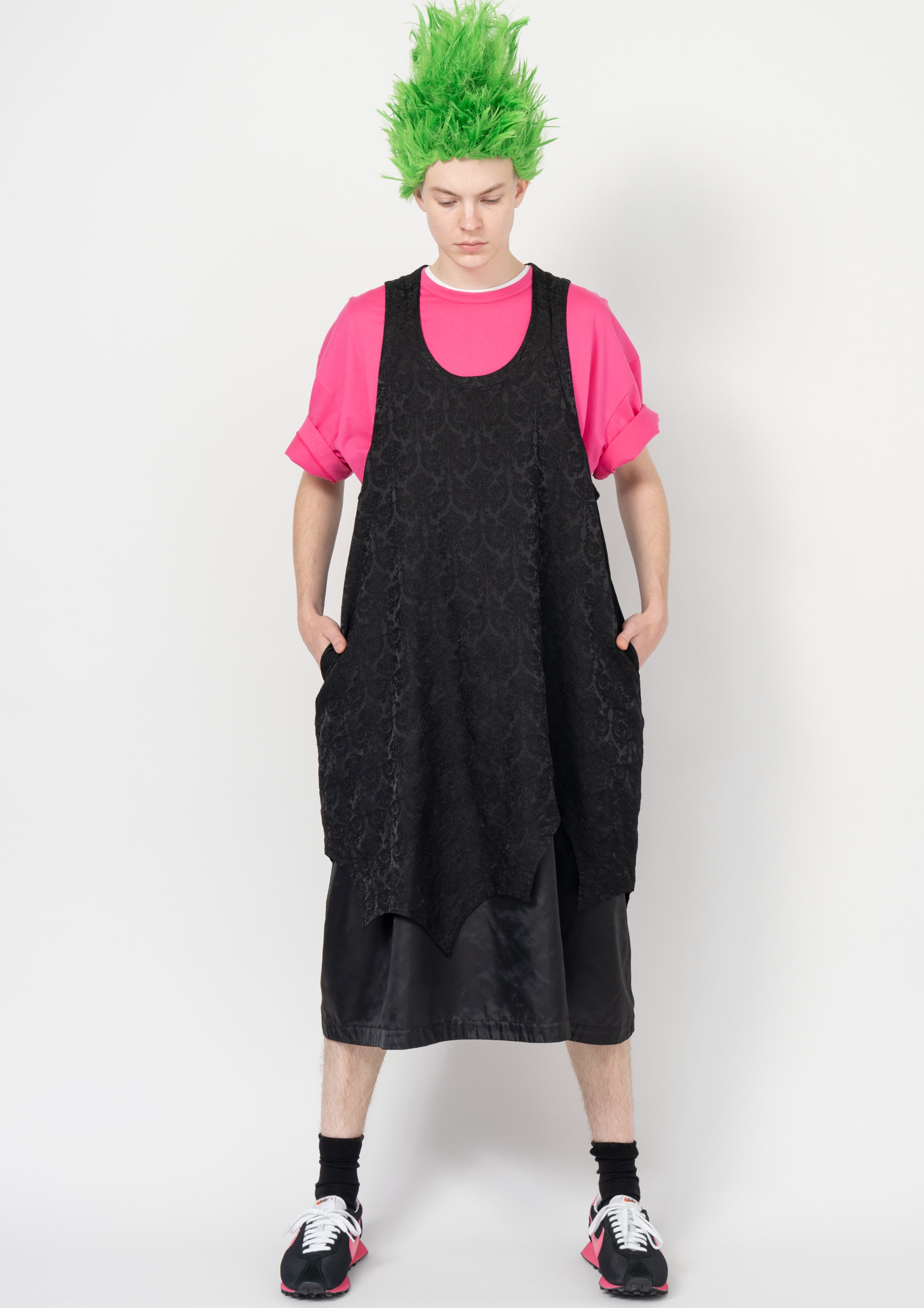 Fashion model wearing a Black Comme des Garçons SS26 outfit