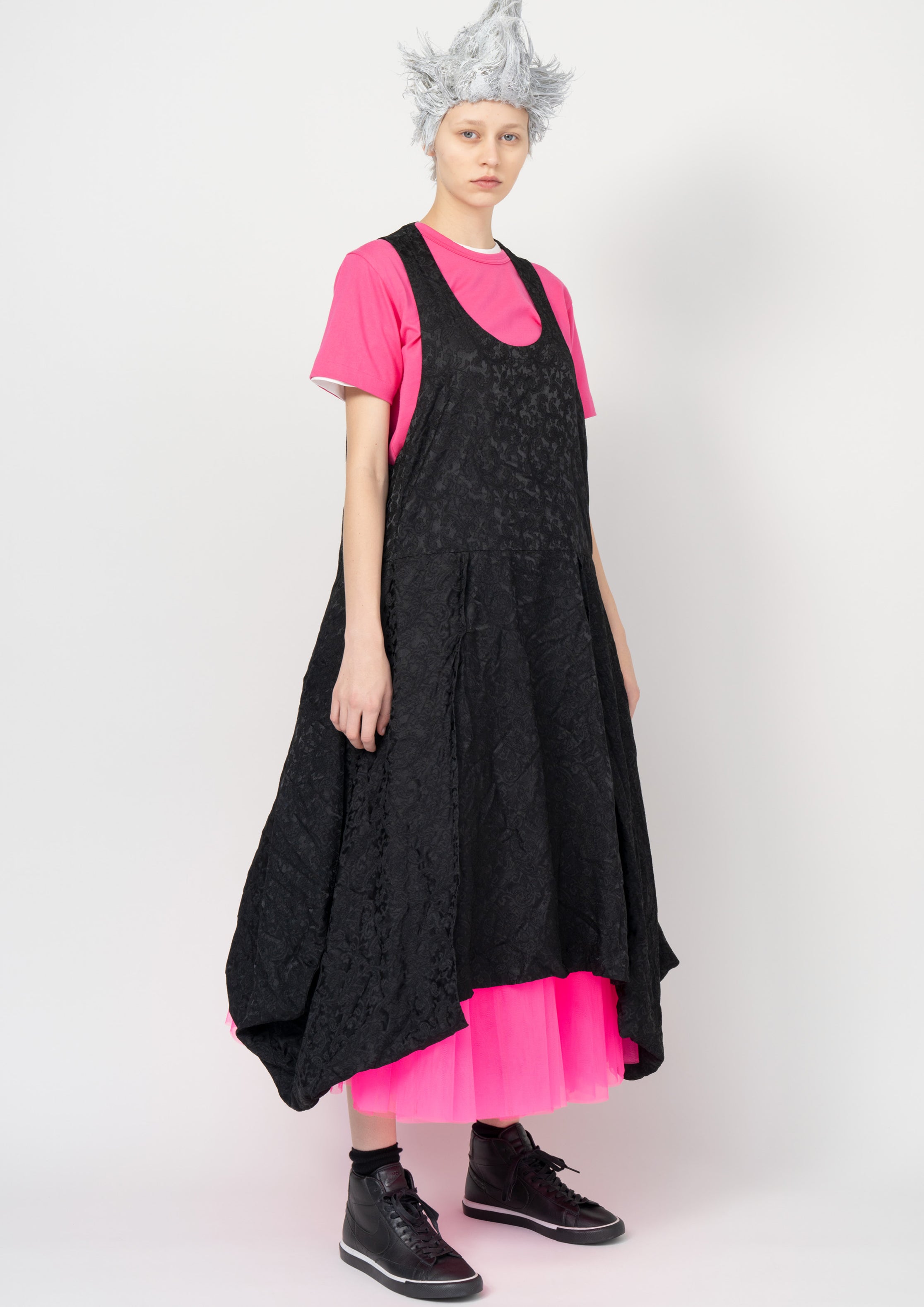 Fashion model wearing a Black Comme des Garçons SS26 outfit