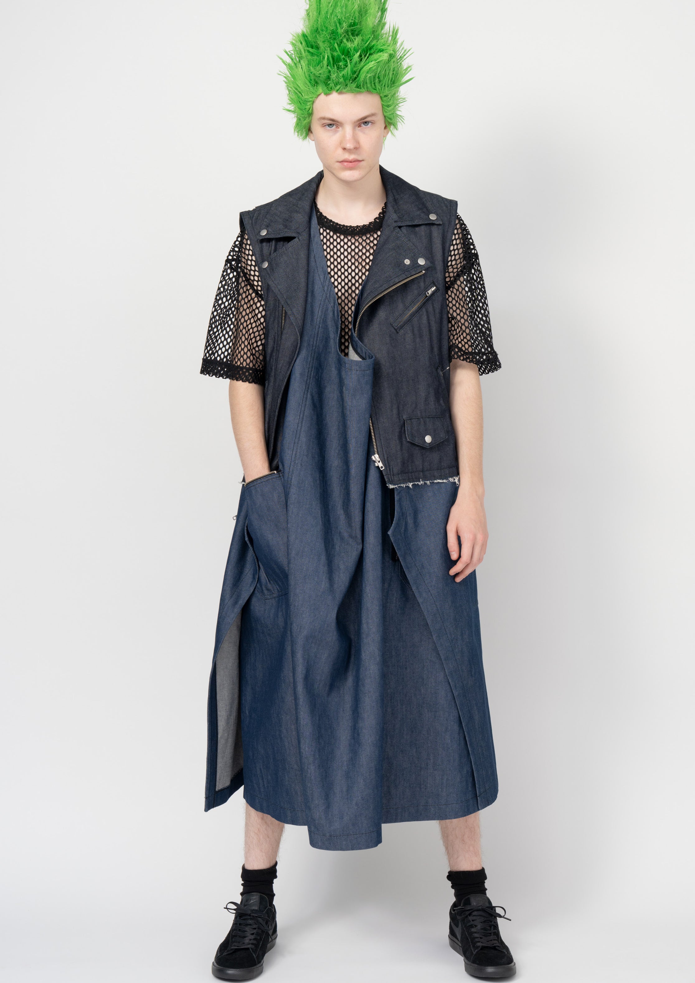 Fashion model wearing a Black Comme des Garçons SS26 outfit