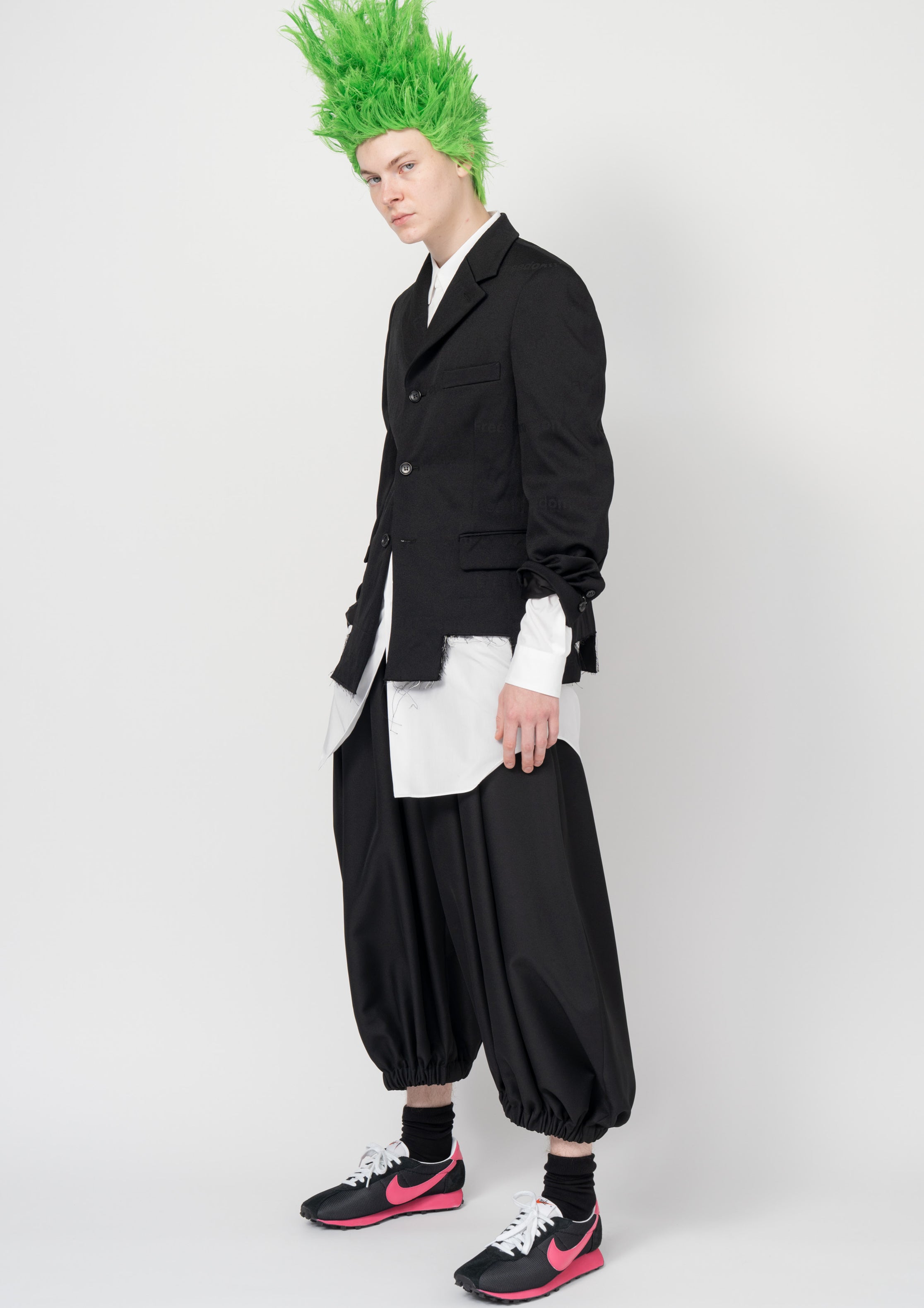 Fashion model wearing a Black Comme des Garçons SS26 outfit