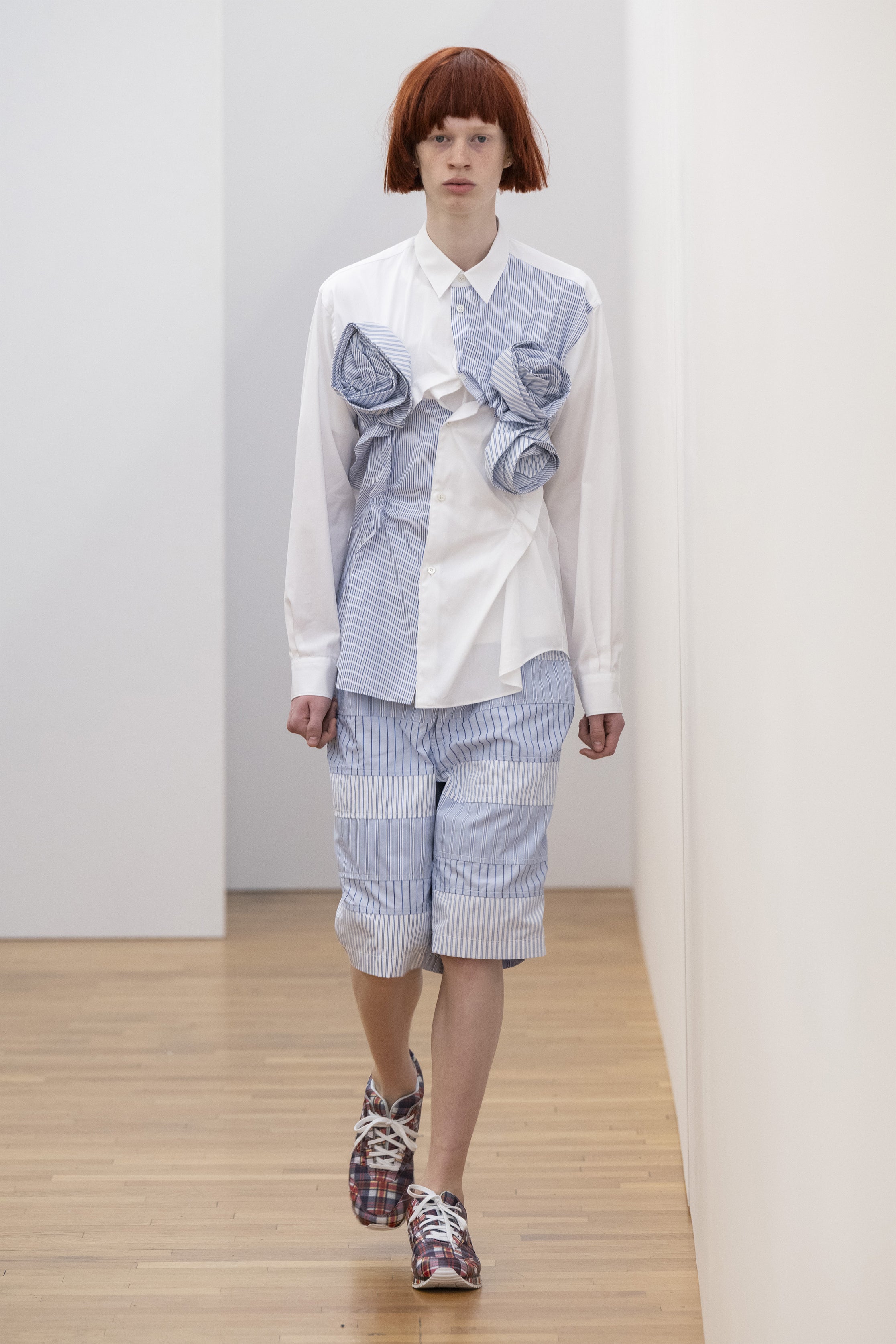 Fashion model wearing a COMME DES GARÇONS SHIRT SS25 outfit