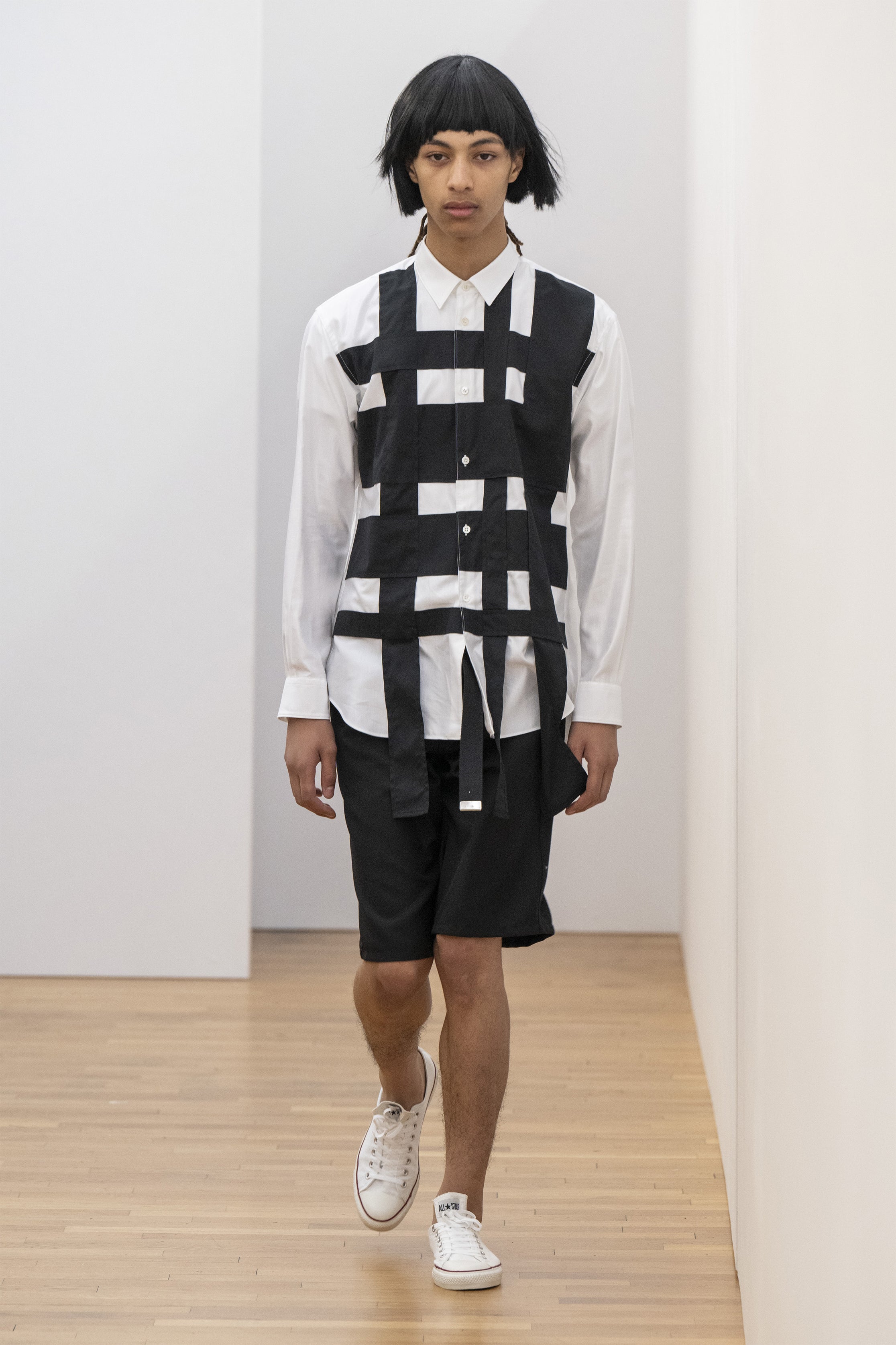 Fashion model wearing a COMME DES GARÇONS SHIRT SS25 outfit