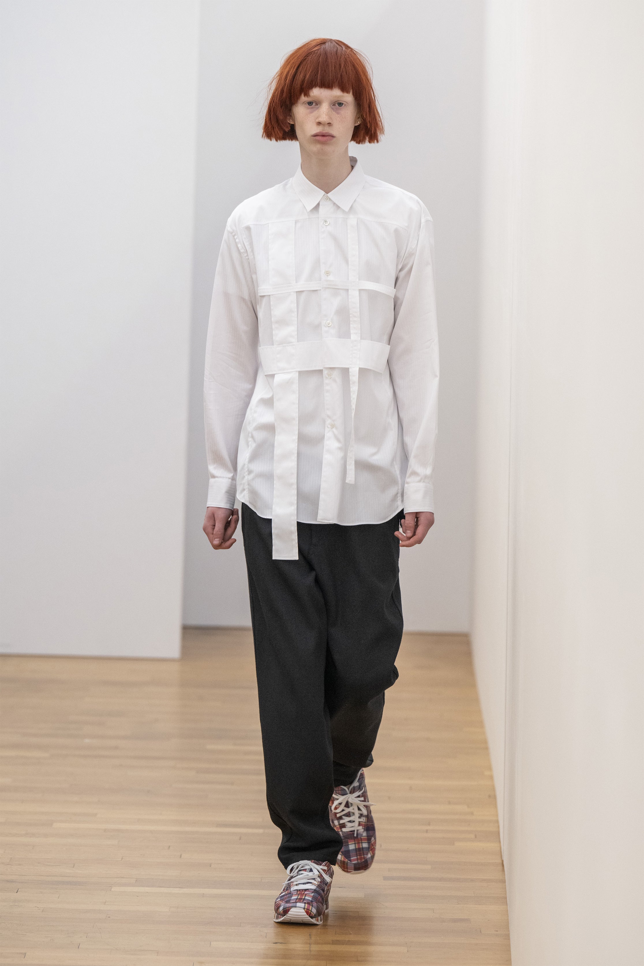 Fashion model wearing a COMME DES GARÇONS SHIRT SS25 outfit