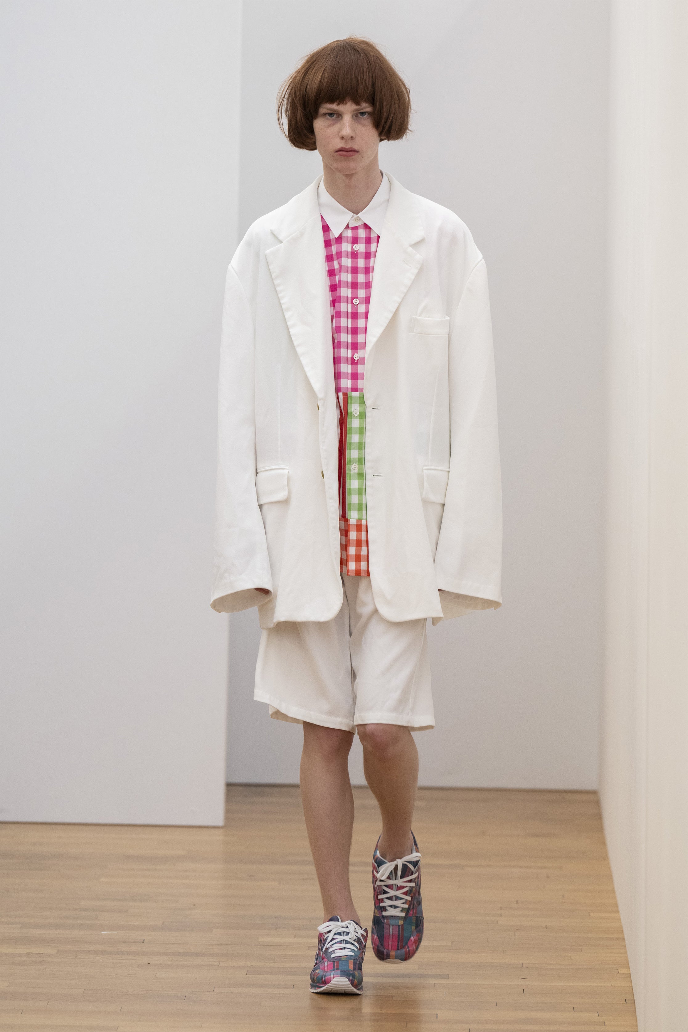 Fashion model wearing a COMME DES GARÇONS SHIRT SS25 outfit