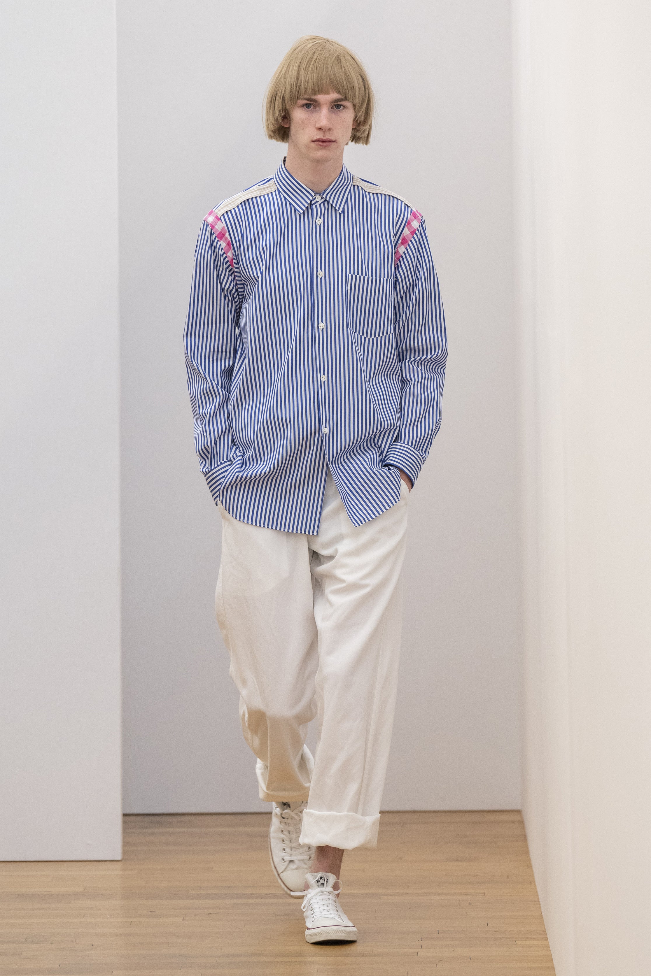 Fashion model wearing a COMME DES GARÇONS SHIRT SS25 outfit