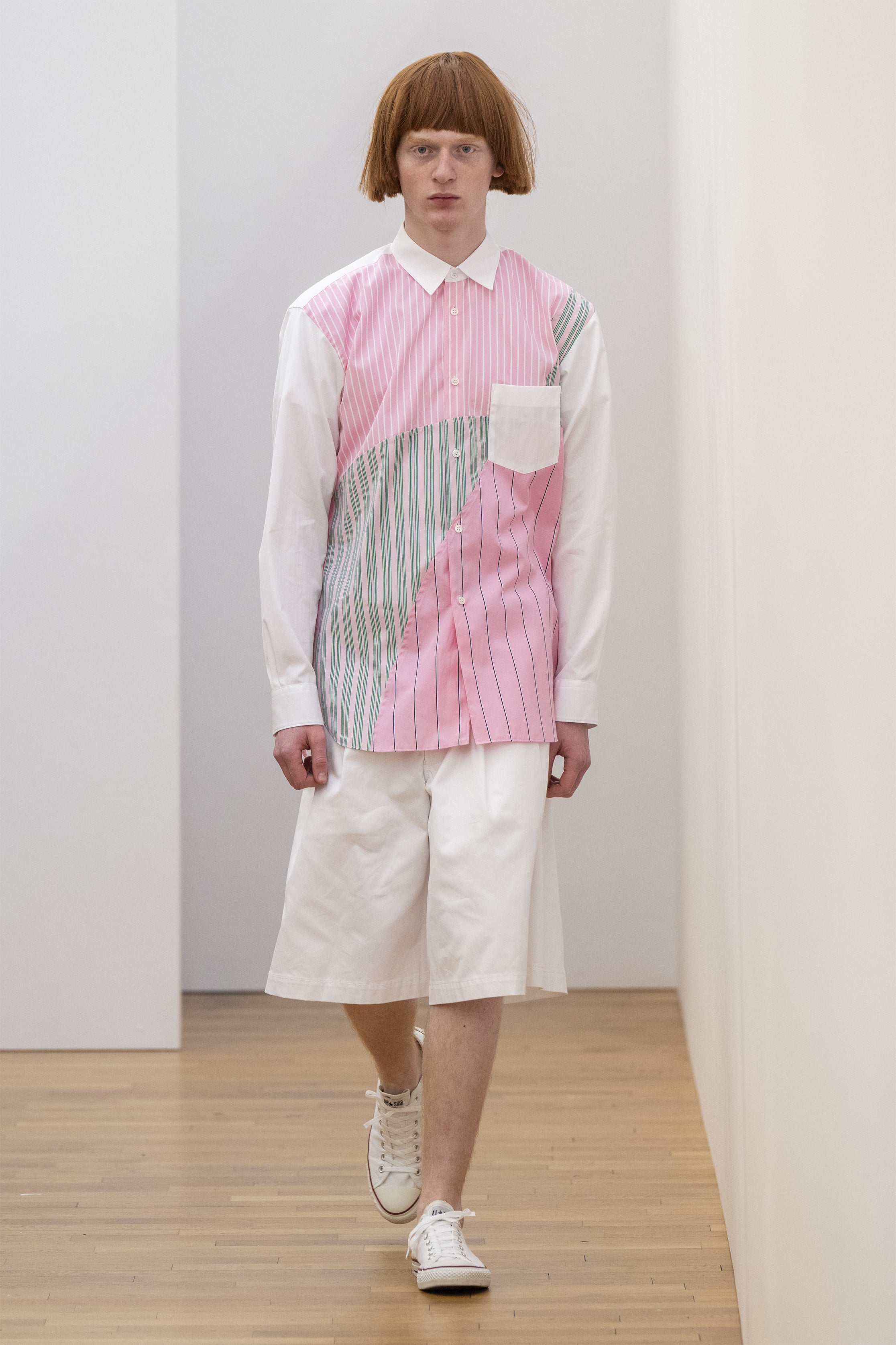 Fashion model wearing a COMME DES GARÇONS SHIRT SS25 outfit