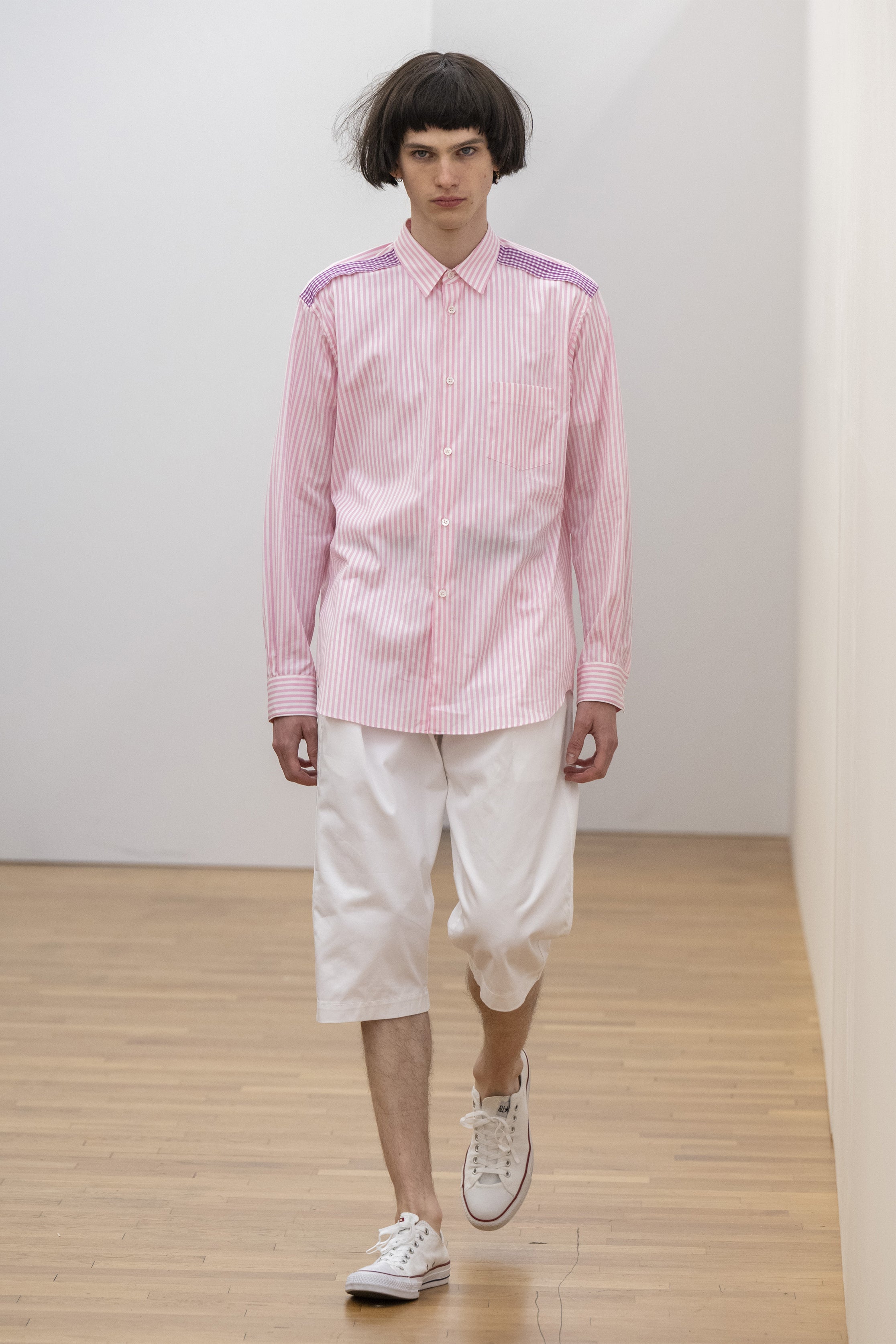 Fashion model wearing a COMME DES GARÇONS SHIRT SS25 outfit