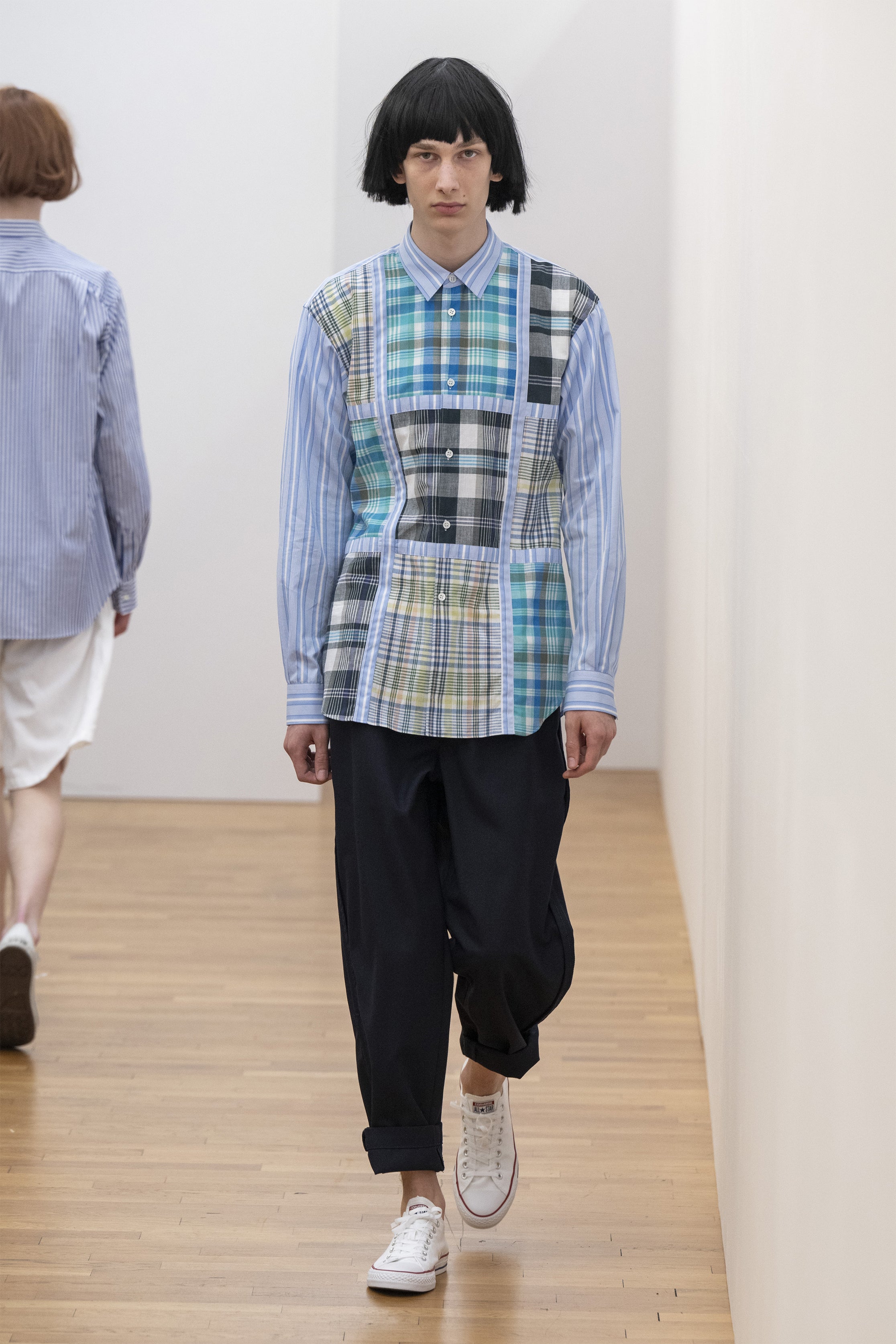 Fashion model wearing a COMME DES GARÇONS SHIRT SS25 outfit