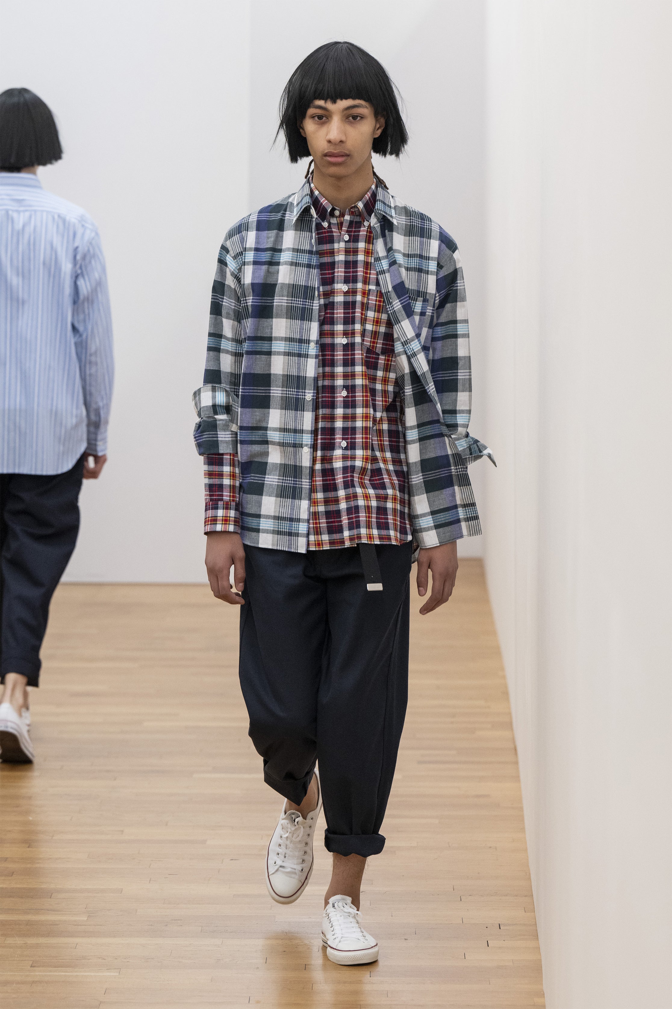 Fashion model wearing a COMME DES GARÇONS SHIRT SS25 outfit