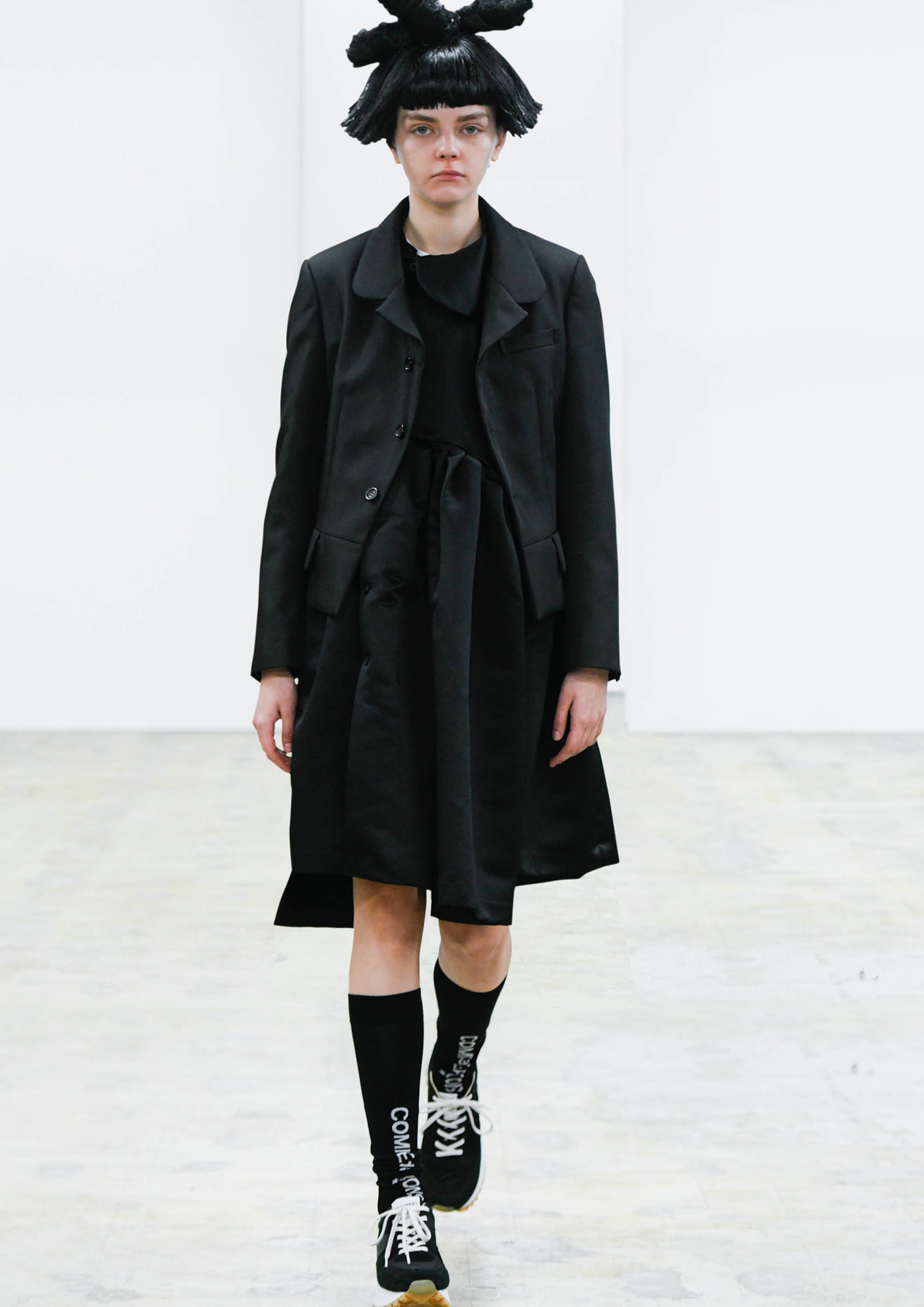 Fashion model wearing a COMME DES GARÇONS COMME DES GARÇONS AW24 outfit