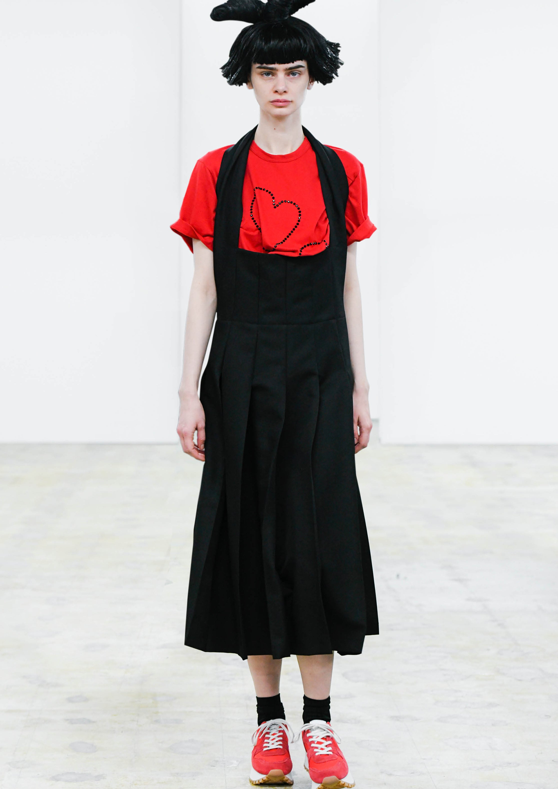 Fashion model wearing a COMME DES GARÇONS COMME DES GARÇONS AW24 outfit