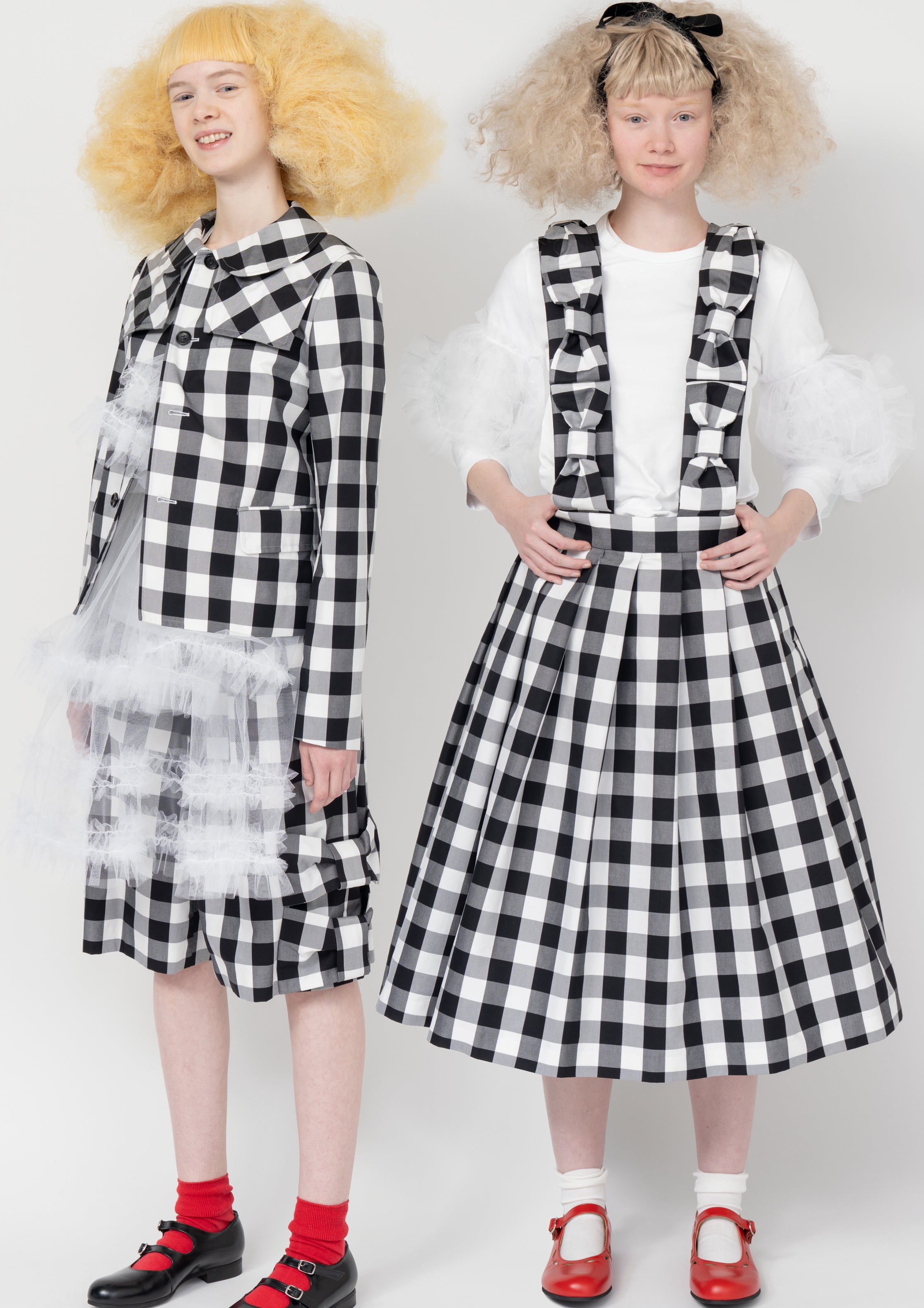 Fashion model wearing a Comme des Garçons SS26 outfit