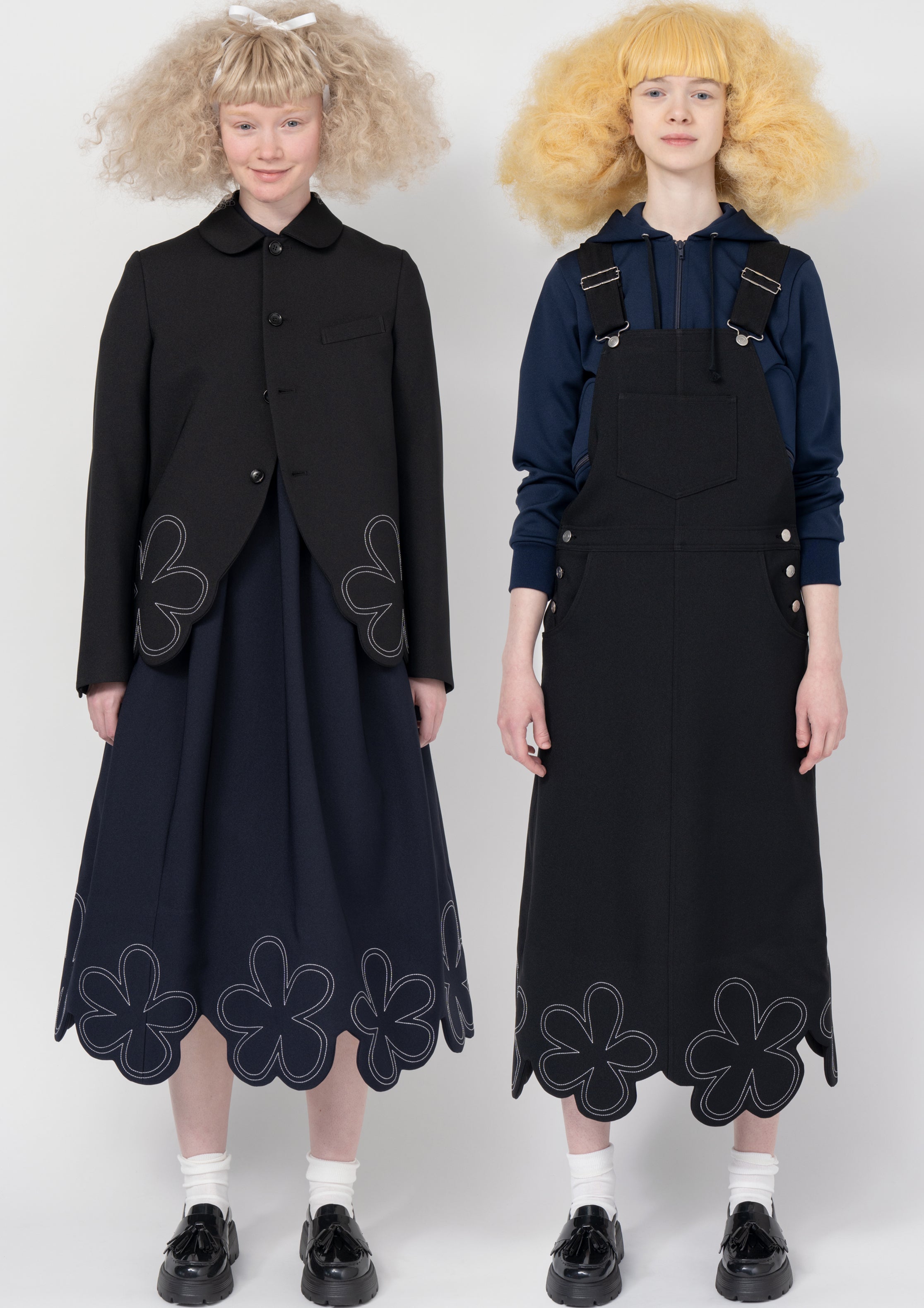 Fashion model wearing a Comme des Garçons SS26 outfit