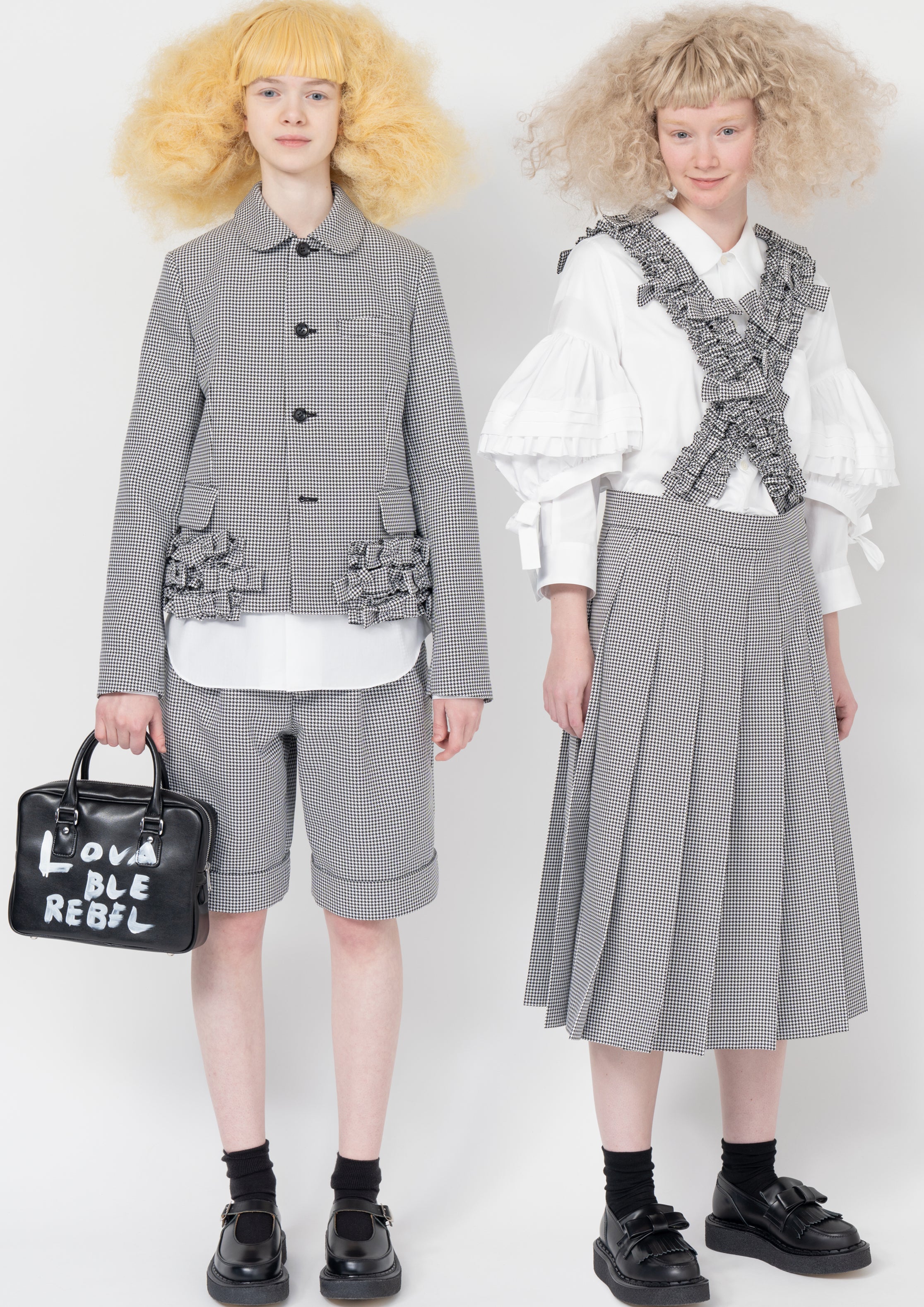 Fashion model wearing a Comme des Garçons SS26 outfit