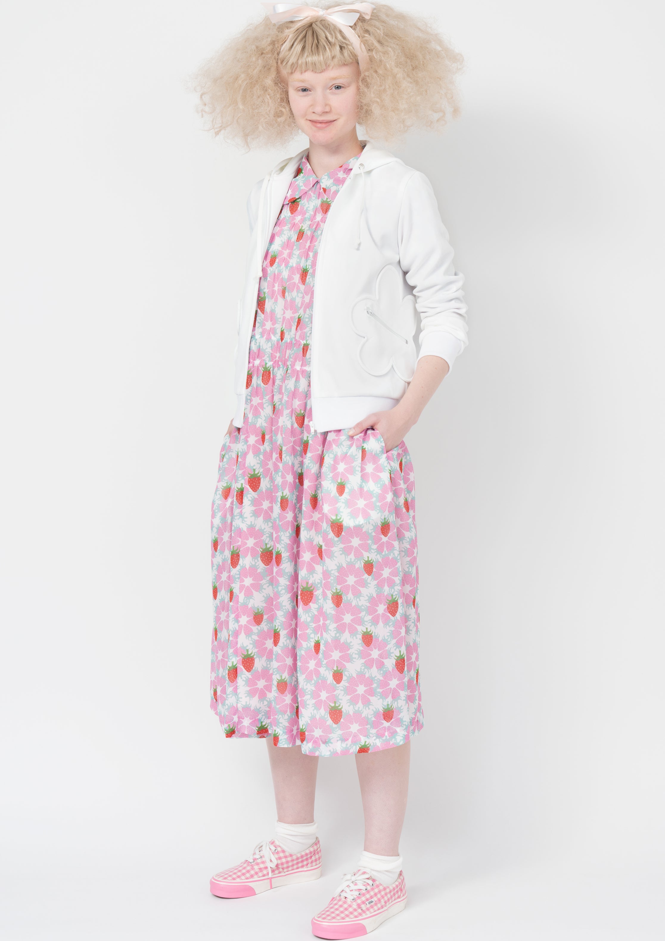 Fashion model wearing a Comme des Garçons SS26 outfit