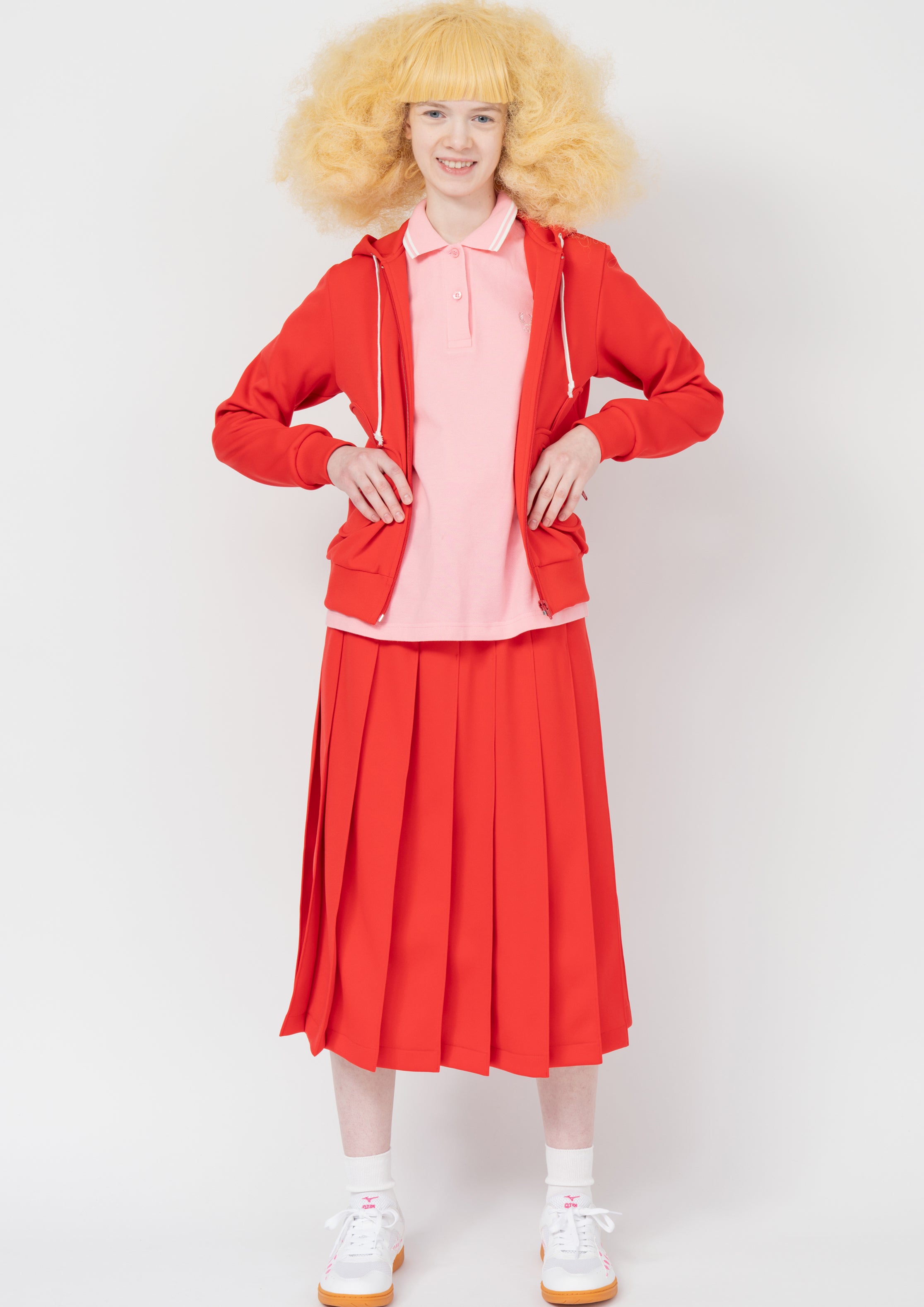 Fashion model wearing a Comme des Garçons SS26 outfit