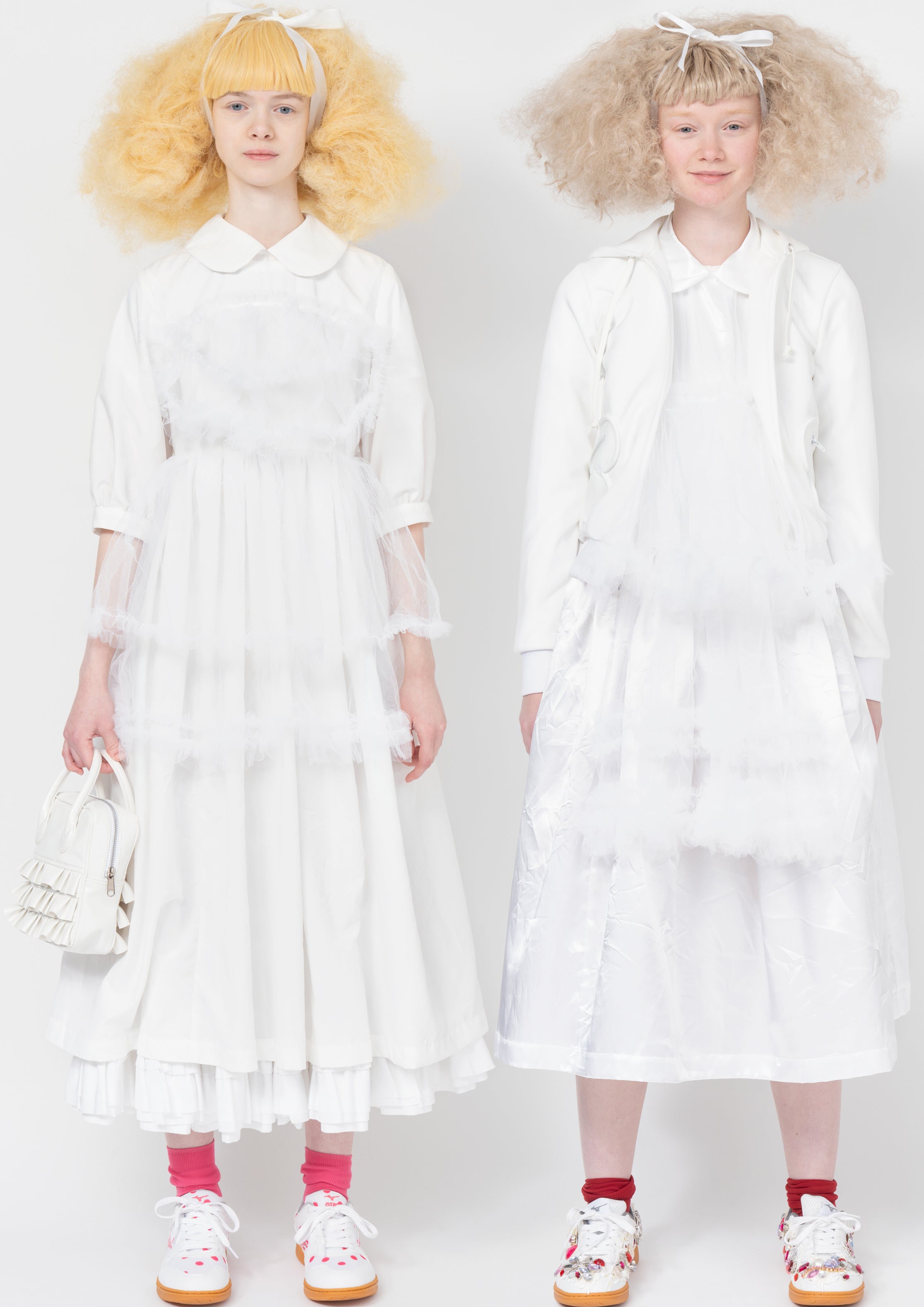 Fashion model wearing a Comme des Garçons SS26 outfit