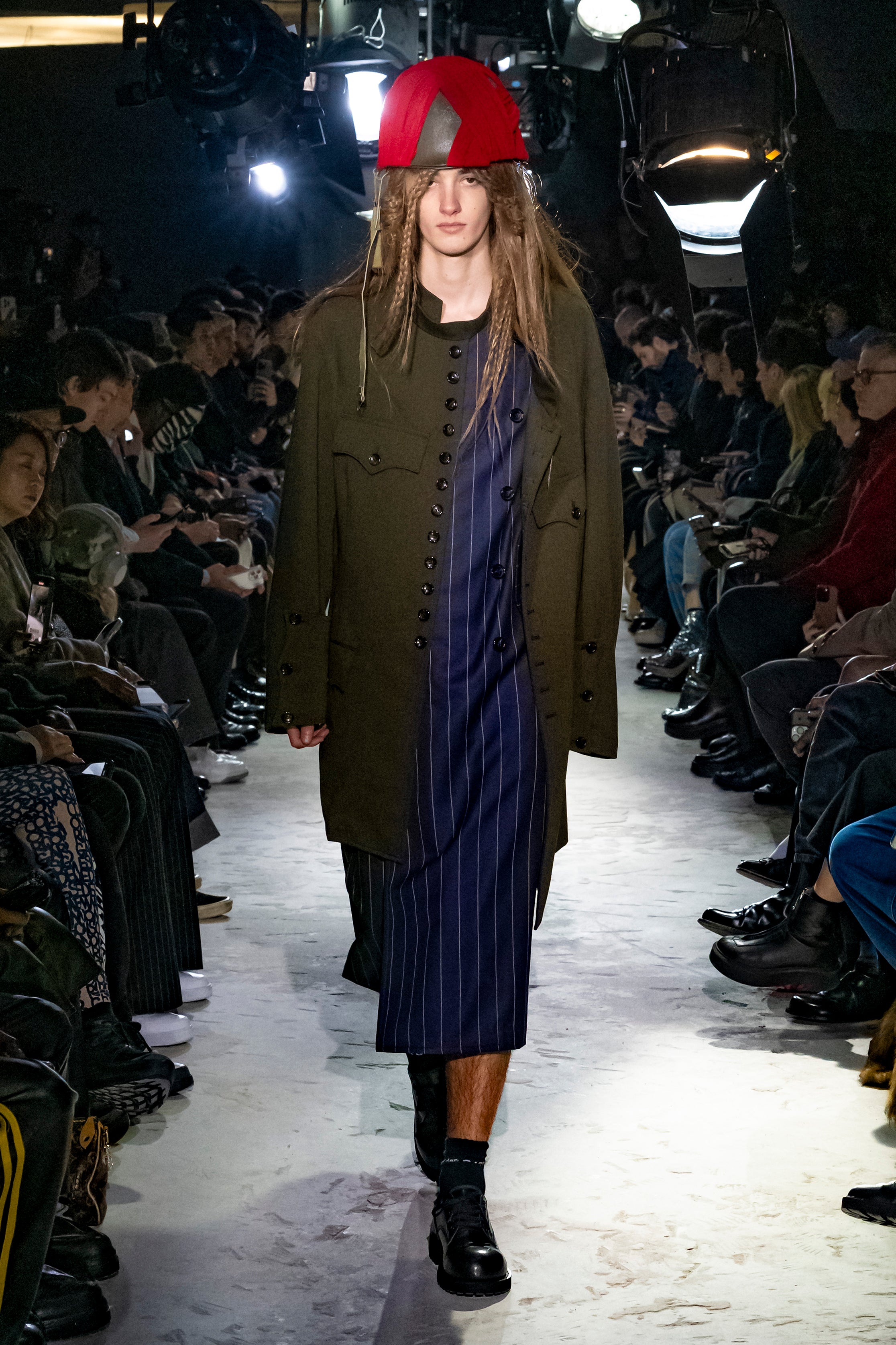 Fashion model wearing a Comme des Garçons Homme Plus AW25 outfit