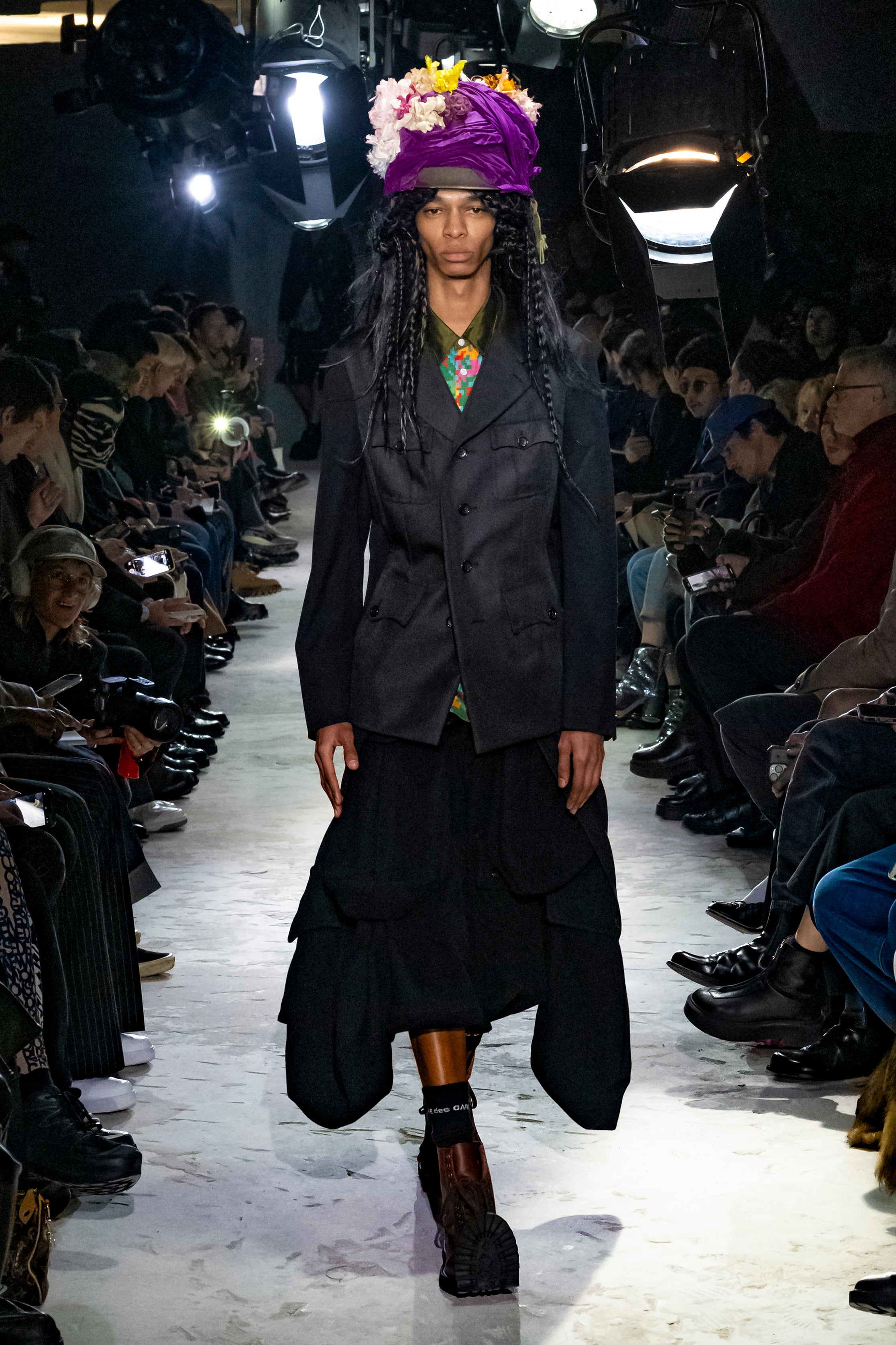 Fashion model wearing a Comme des Garçons Homme Plus AW25 outfit