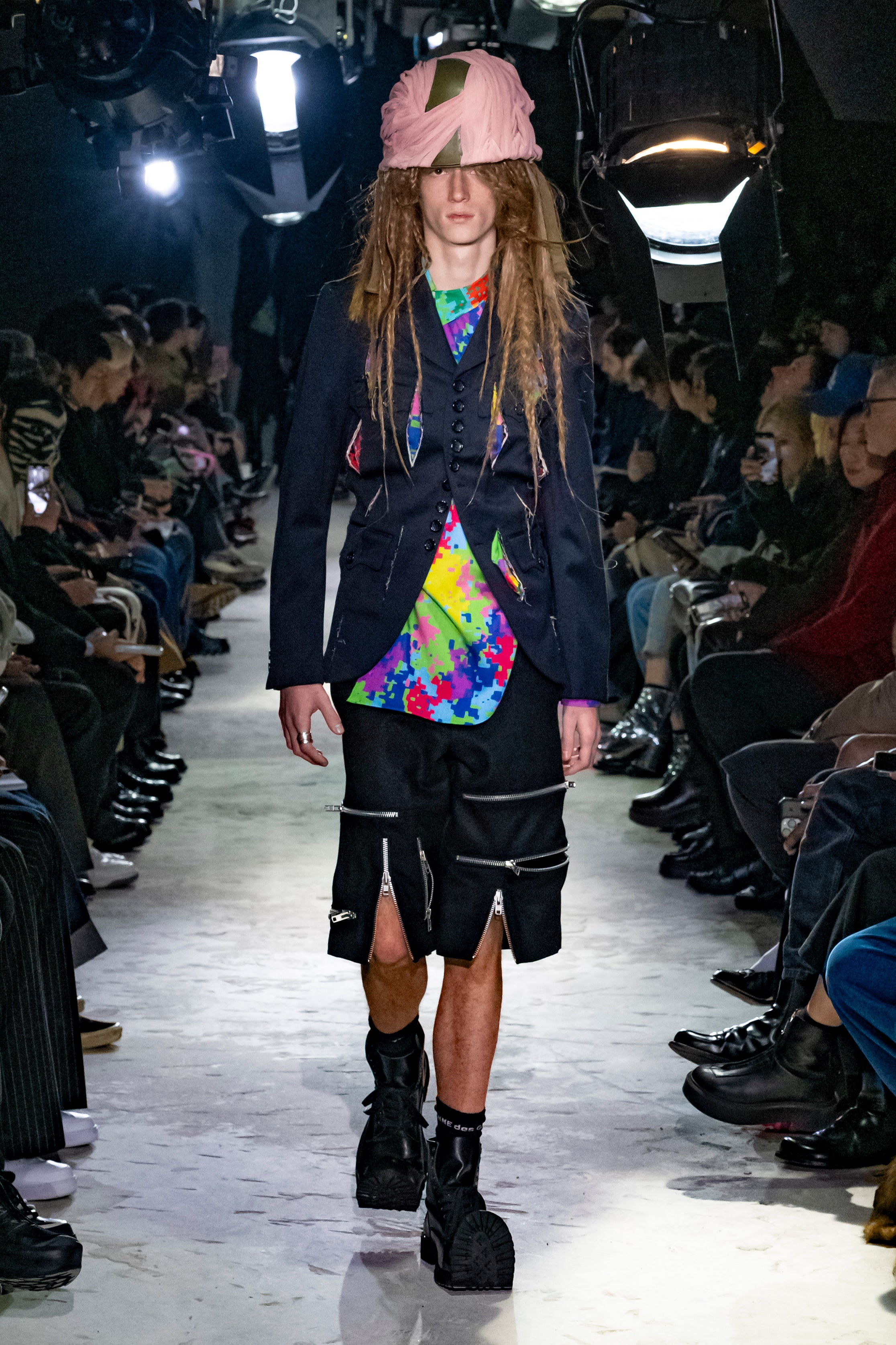 Fashion model wearing a Comme des Garçons Homme Plus AW25 outfit
