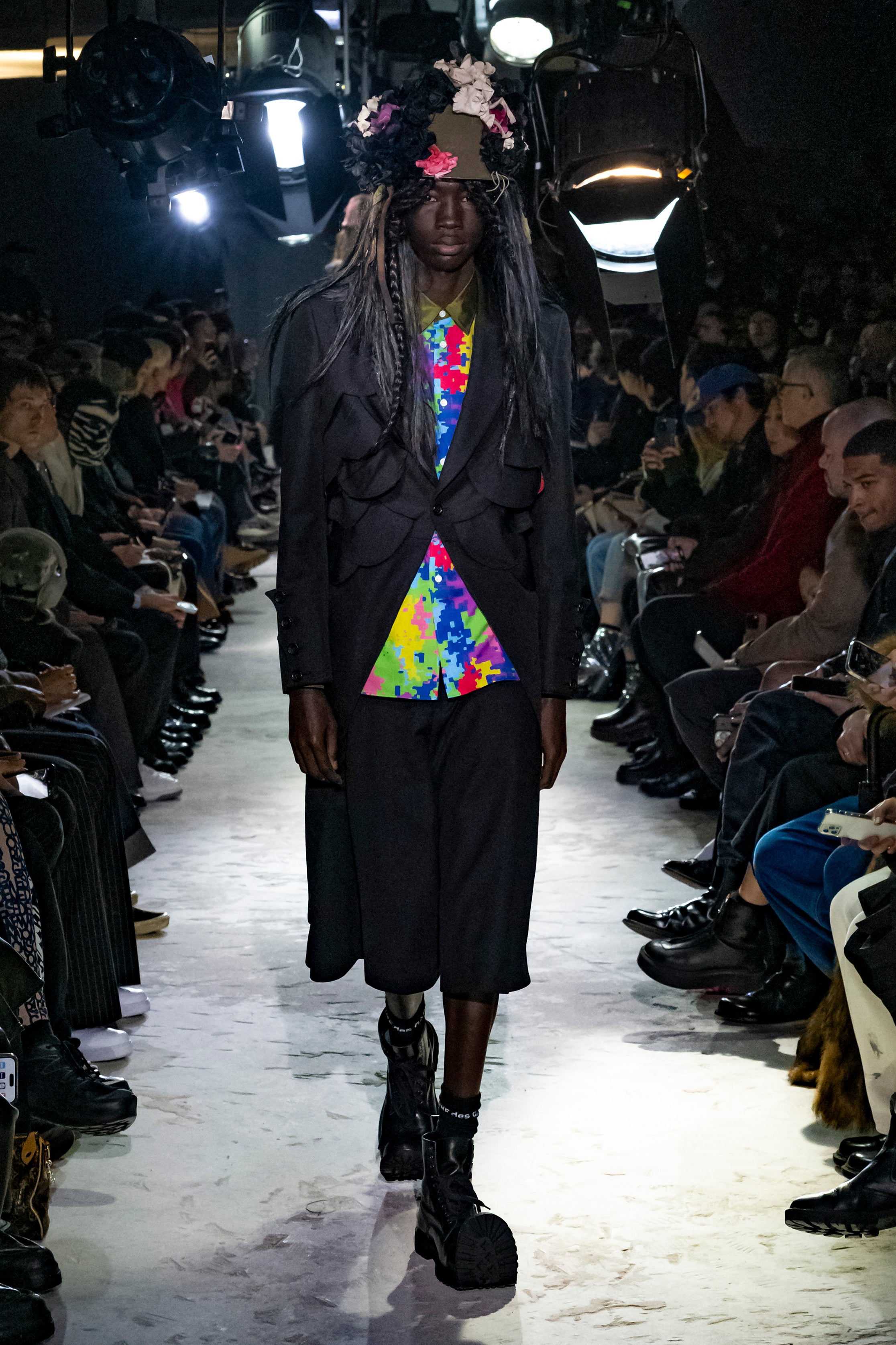 Fashion model wearing a Comme des Garçons Homme Plus AW25 outfit