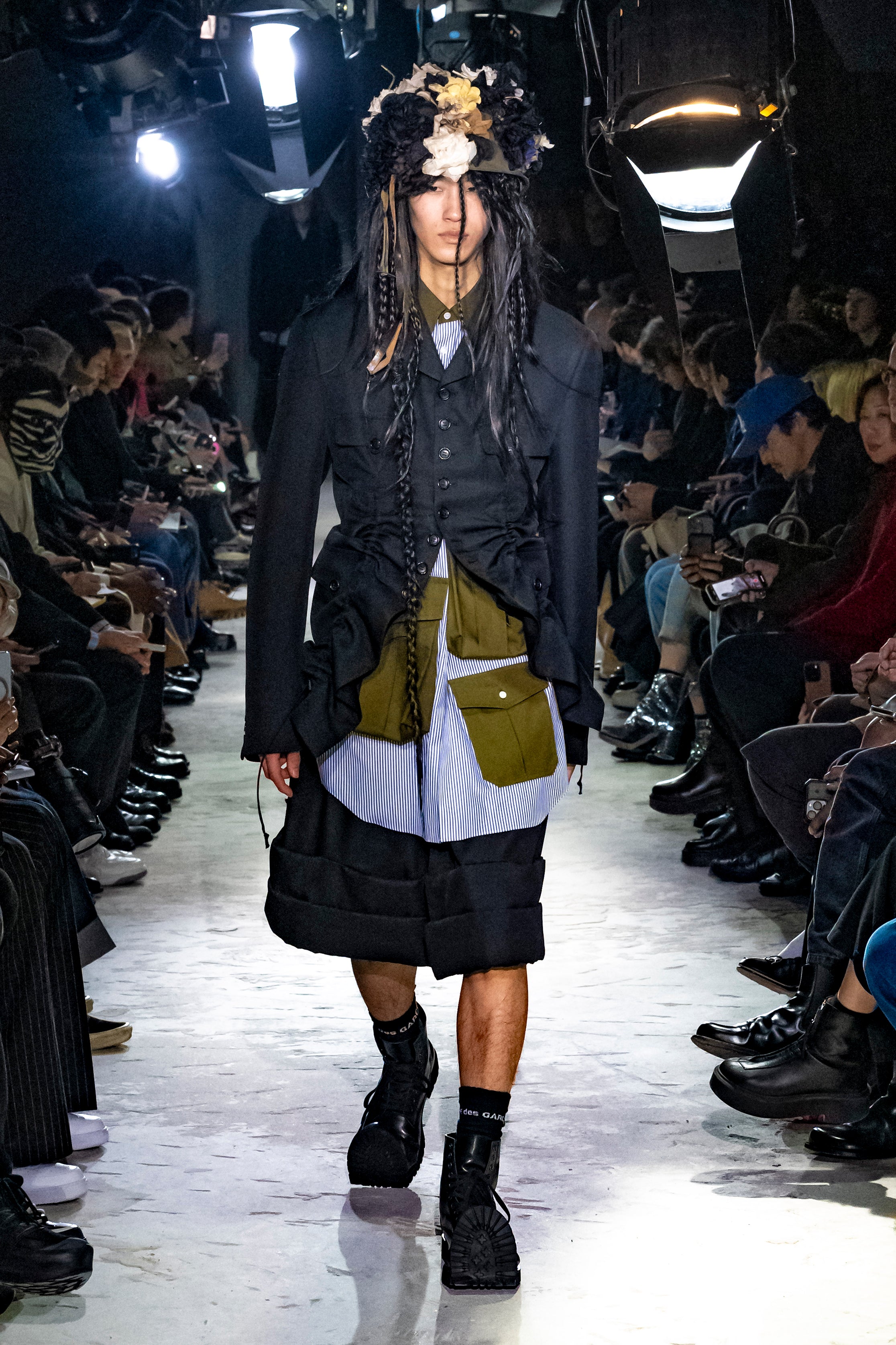 Fashion model wearing a Comme des Garçons Homme Plus AW25 outfit
