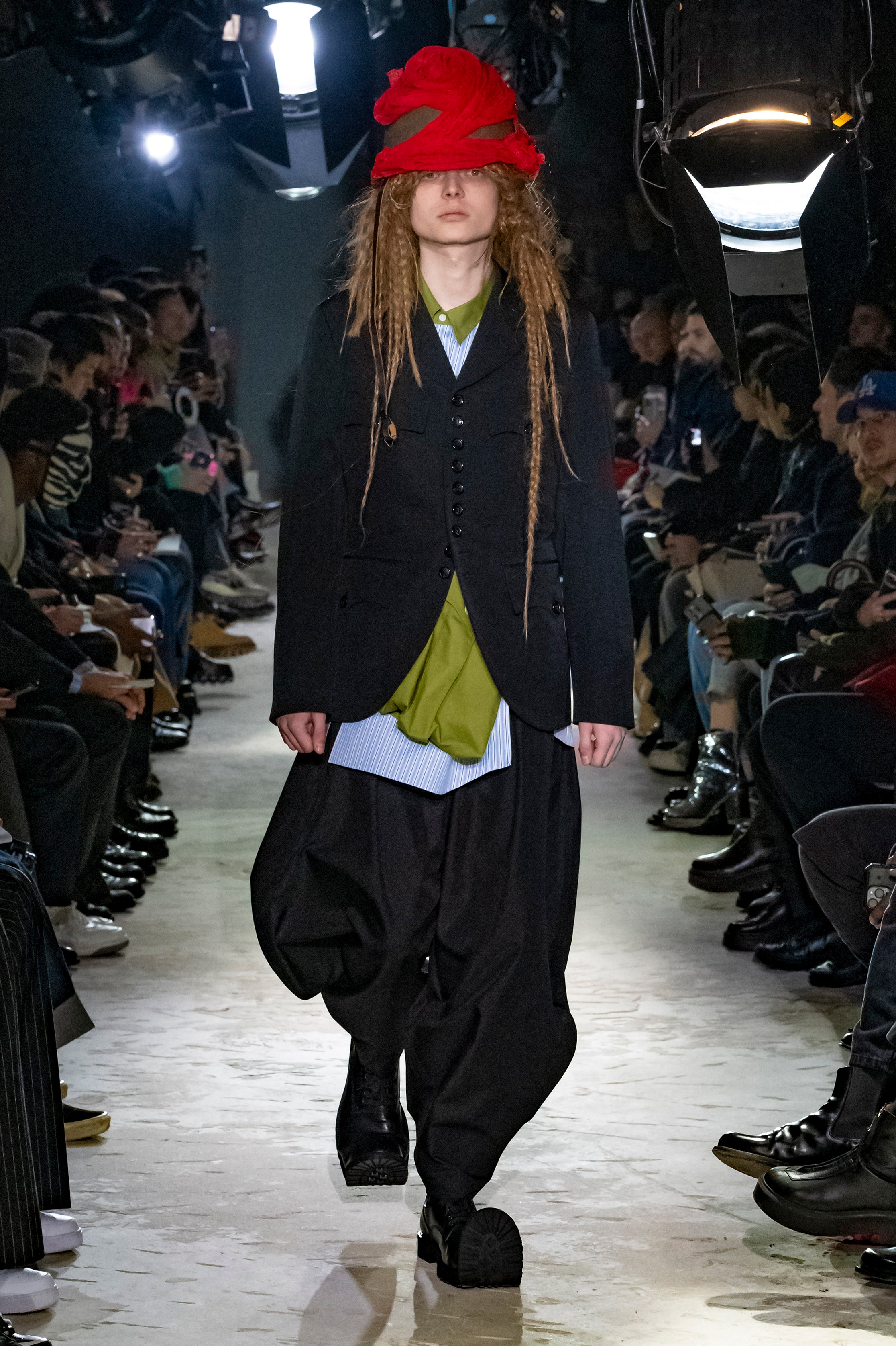 Fashion model wearing a Comme des Garçons Homme Plus AW25 outfit