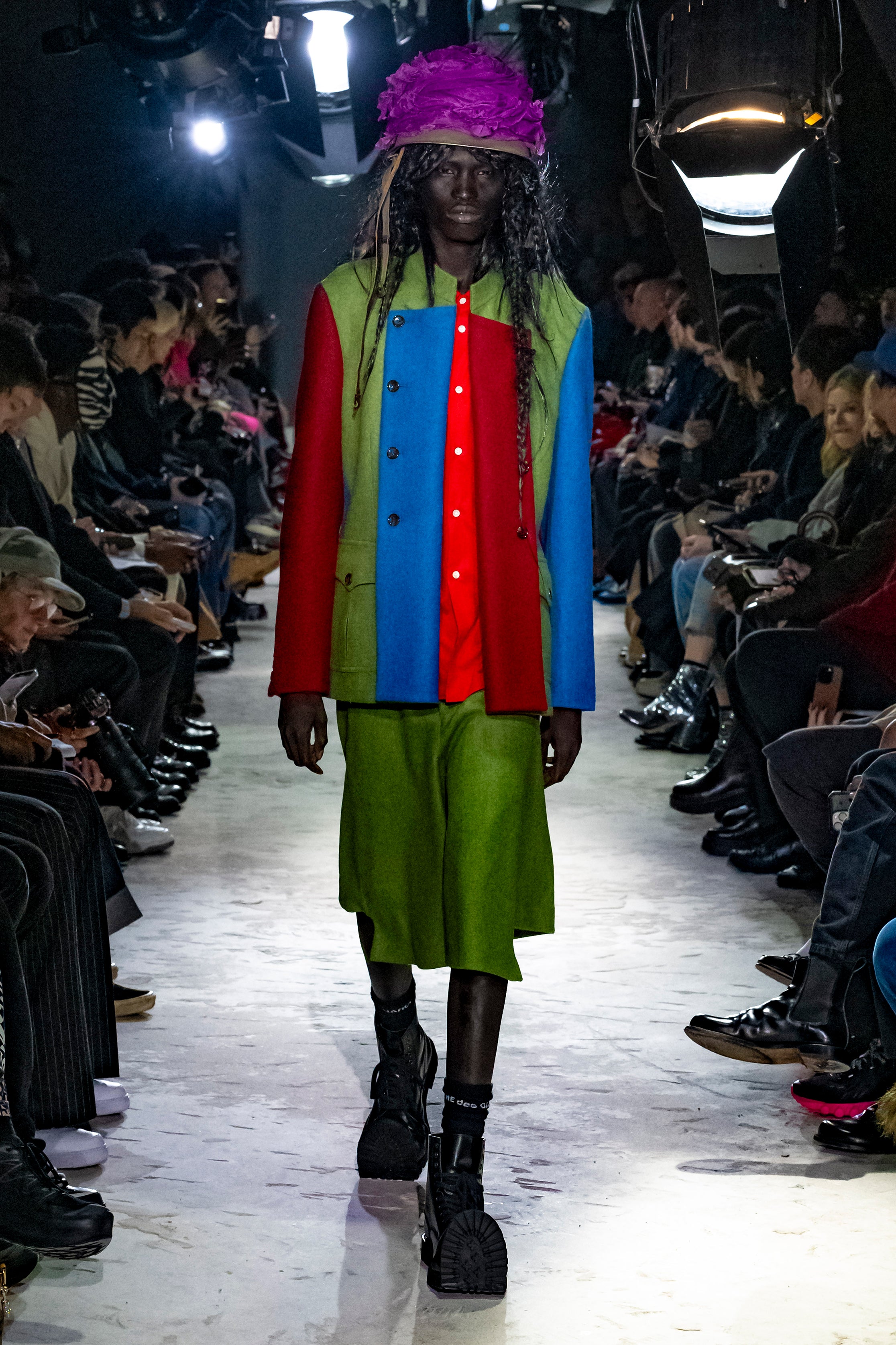 Fashion model wearing a Comme des Garçons Homme Plus AW25 outfit
