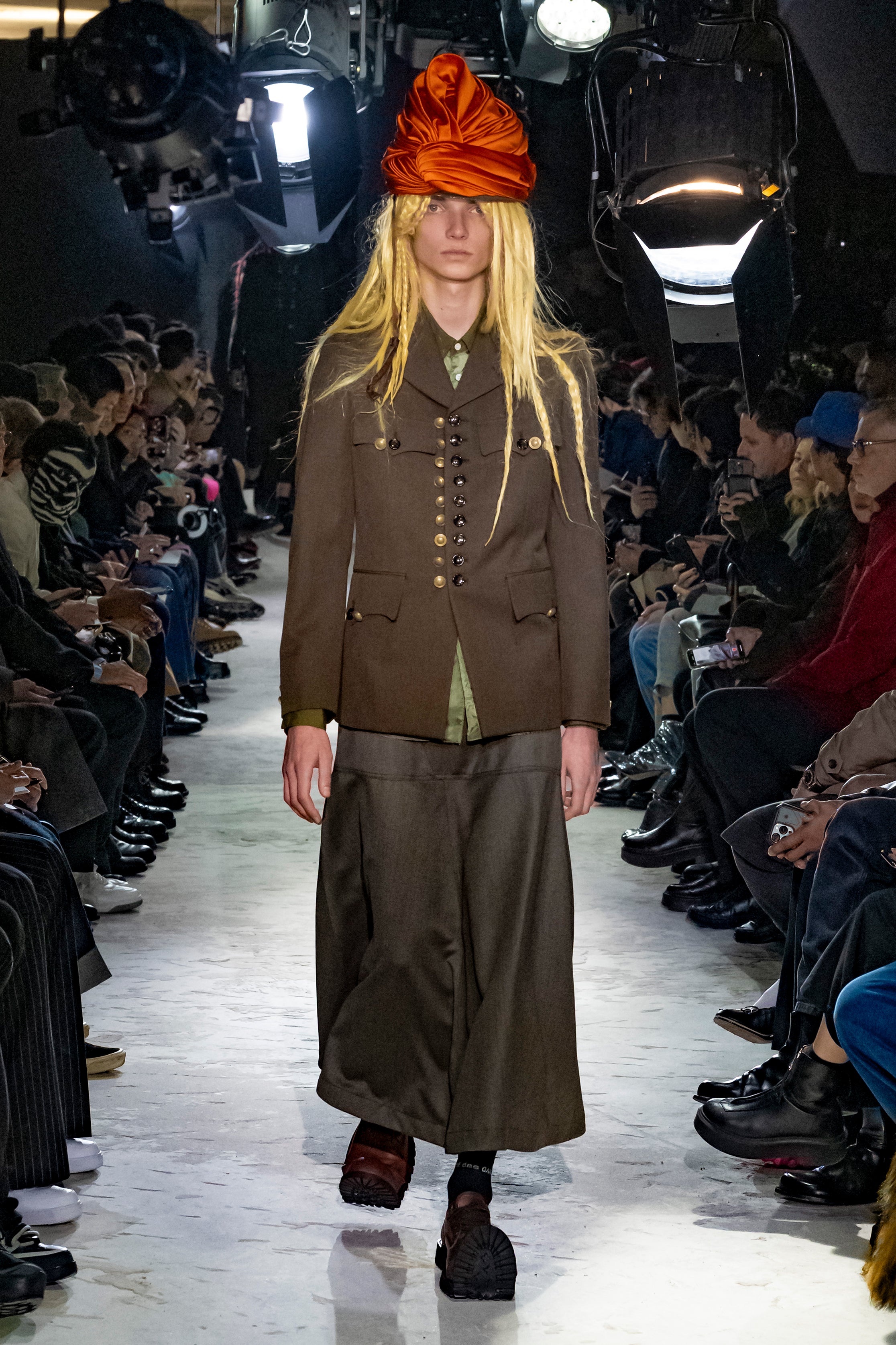 Fashion model wearing a Comme des Garçons Homme Plus AW25 outfit