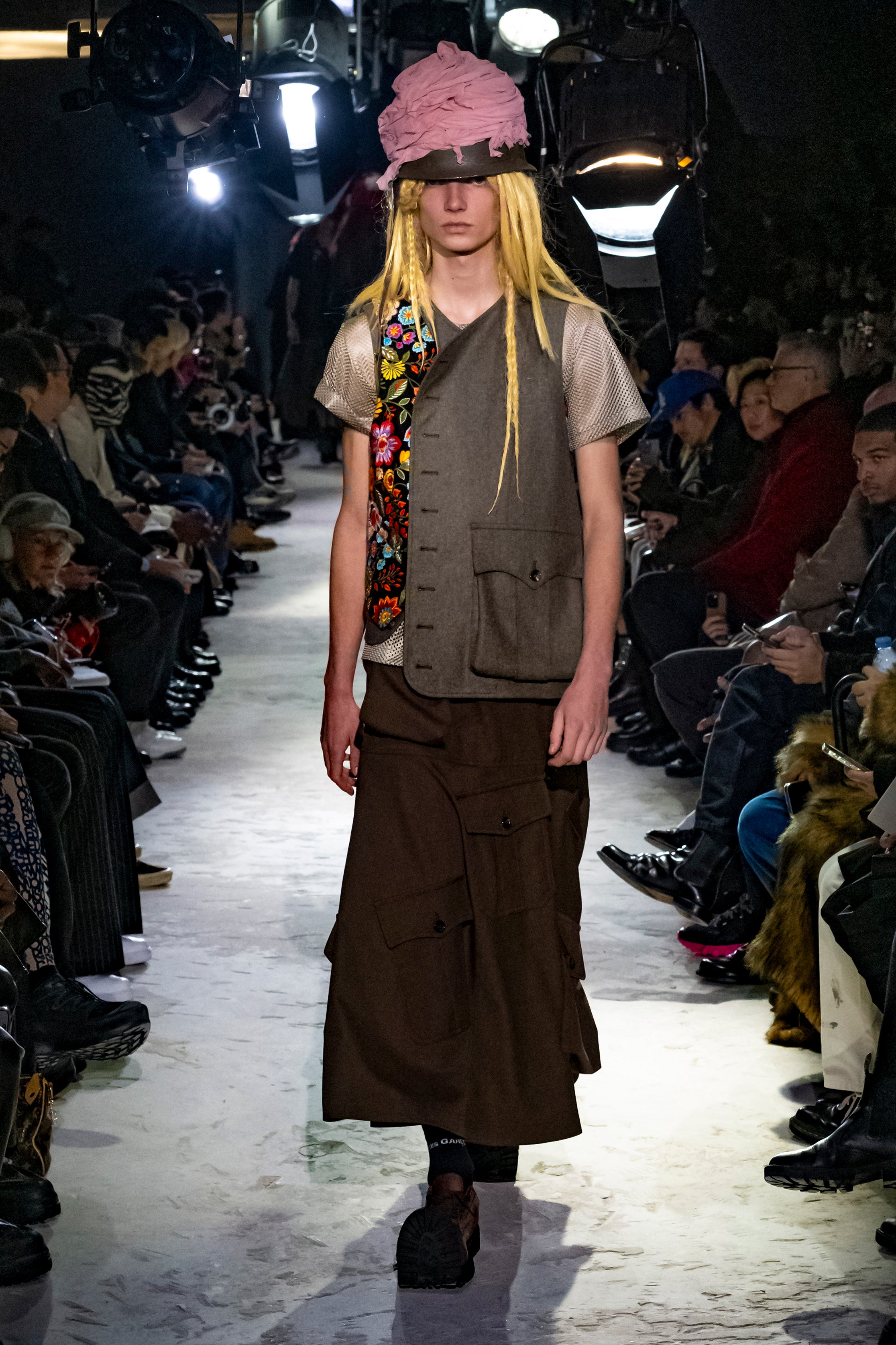 Fashion model wearing a Comme des Garçons Homme Plus AW25 outfit