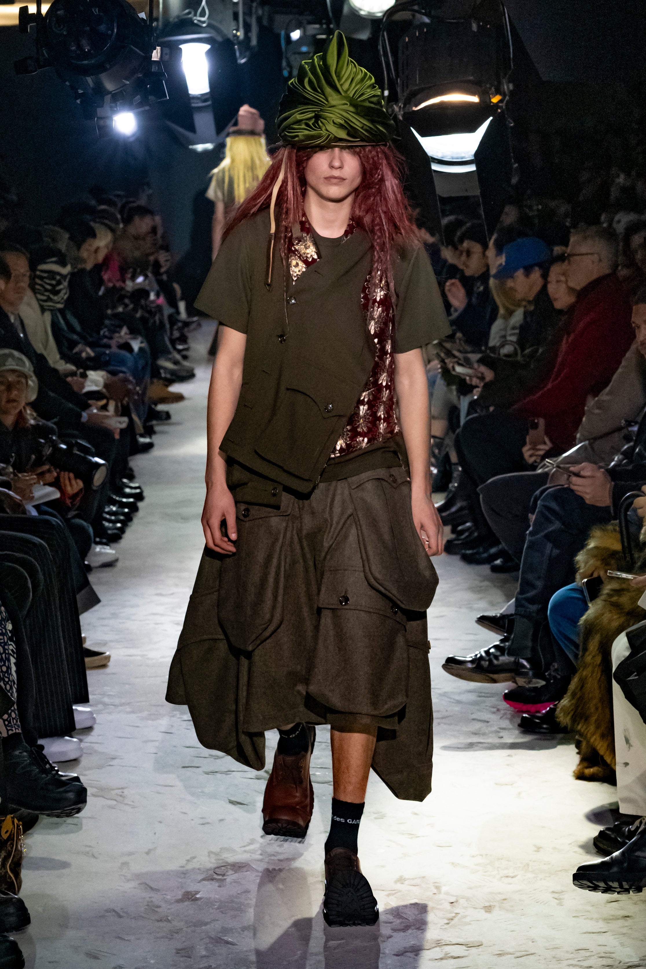 Fashion model wearing a Comme des Garçons Homme Plus AW25 outfit