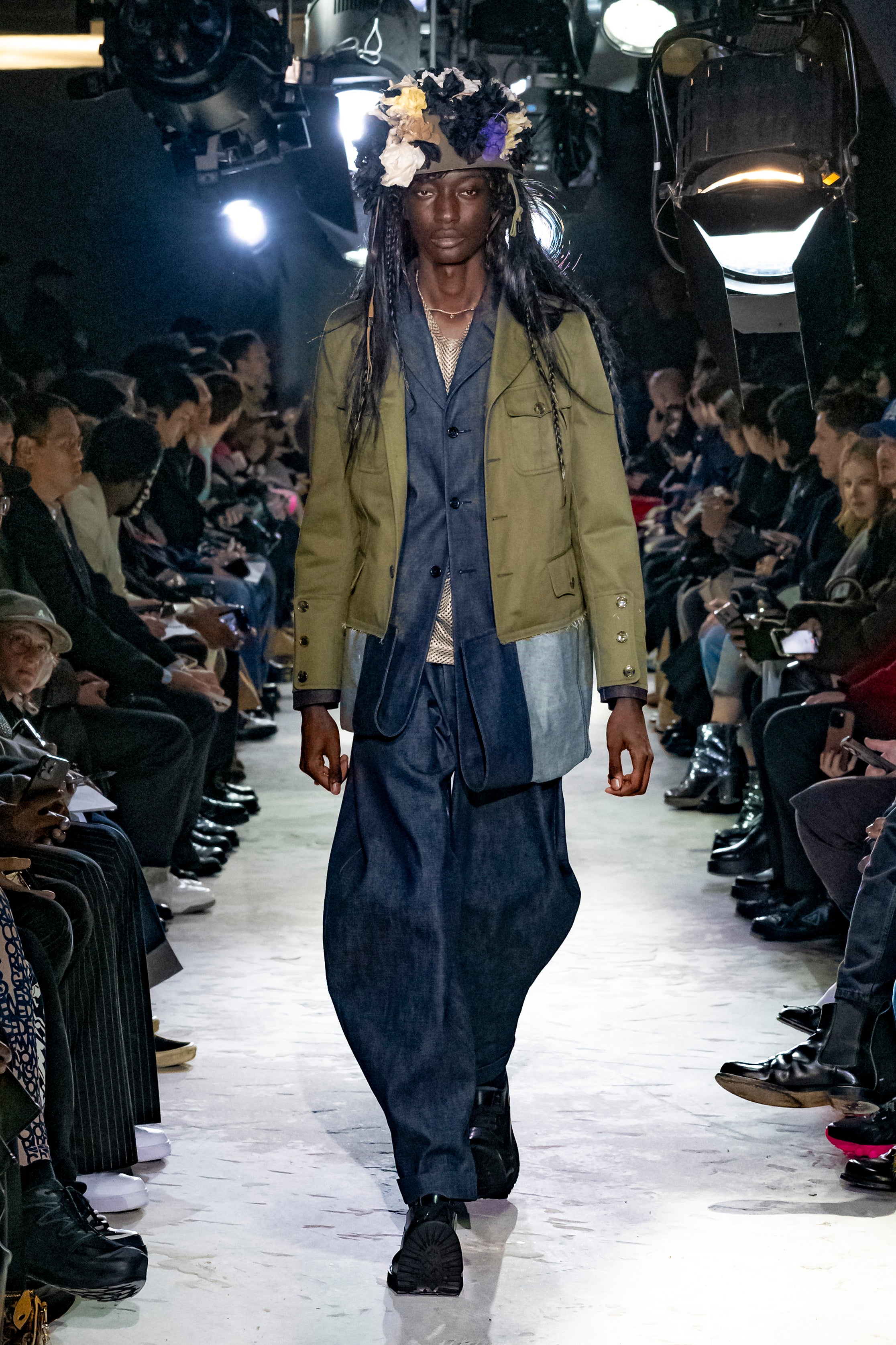 Fashion model wearing a Comme des Garçons Homme Plus AW25 outfit