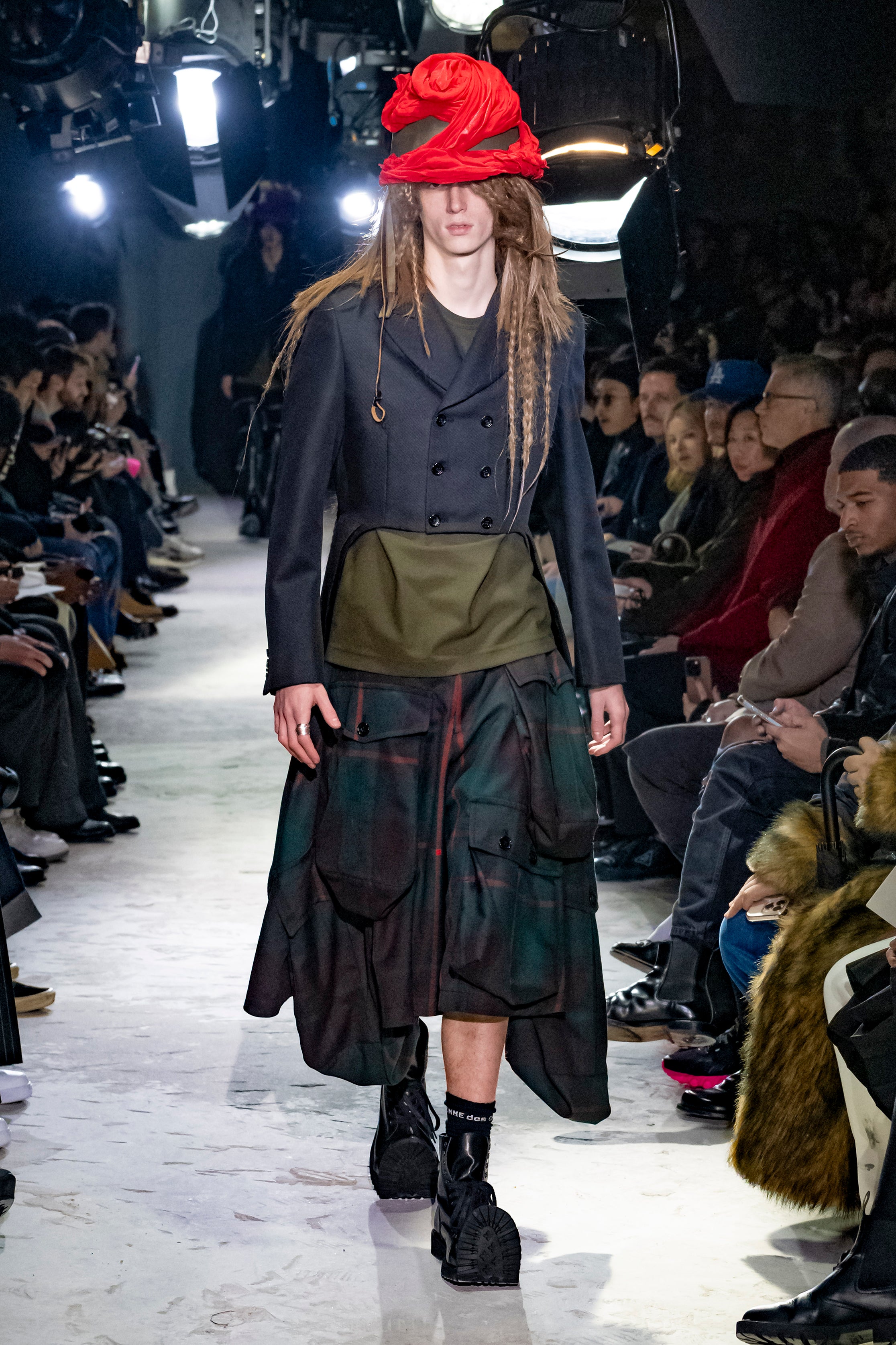 Fashion model wearing a Comme des Garçons Homme Plus AW25 outfit