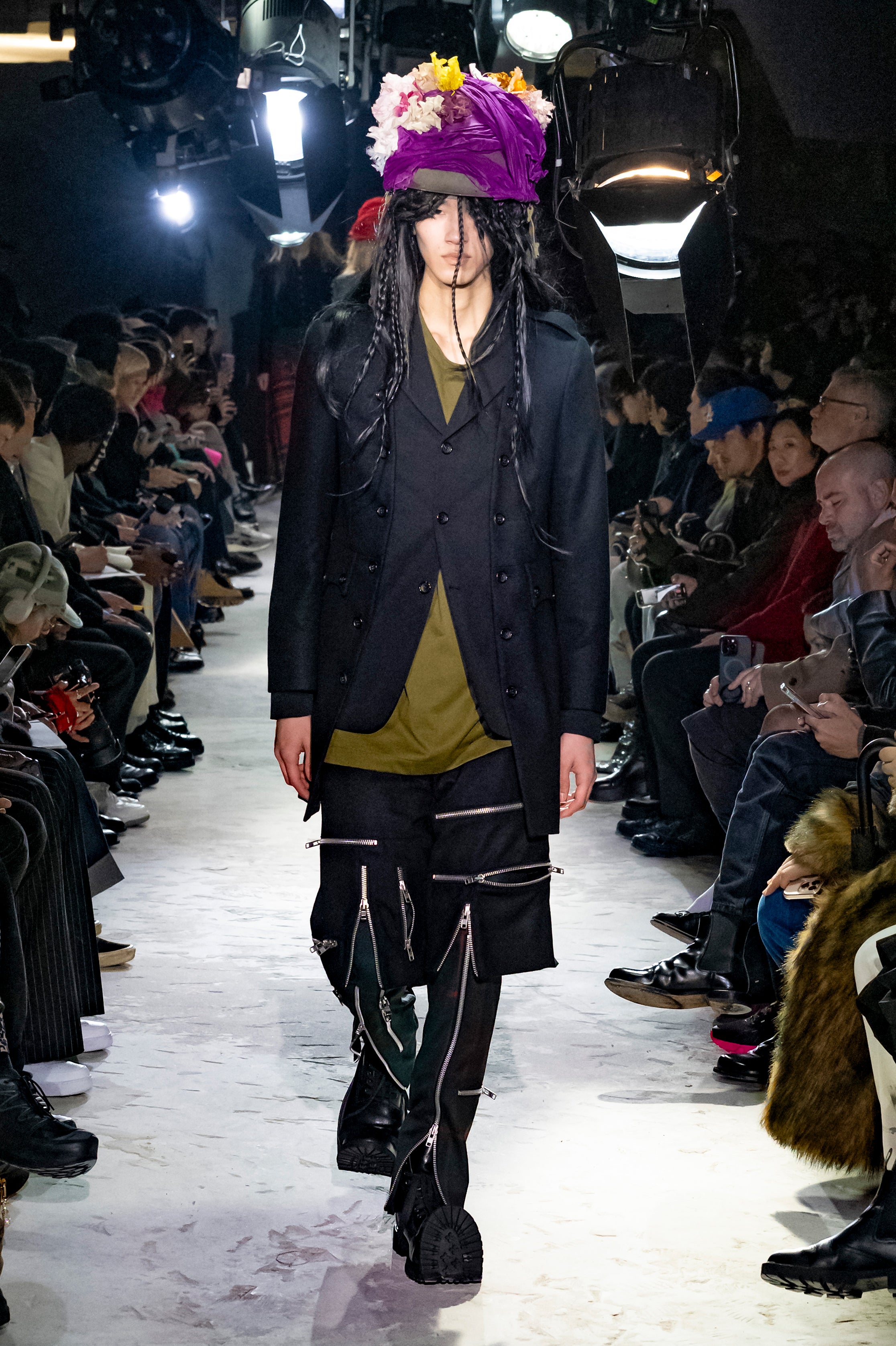 Fashion model wearing a Comme des Garçons Homme Plus AW25 outfit