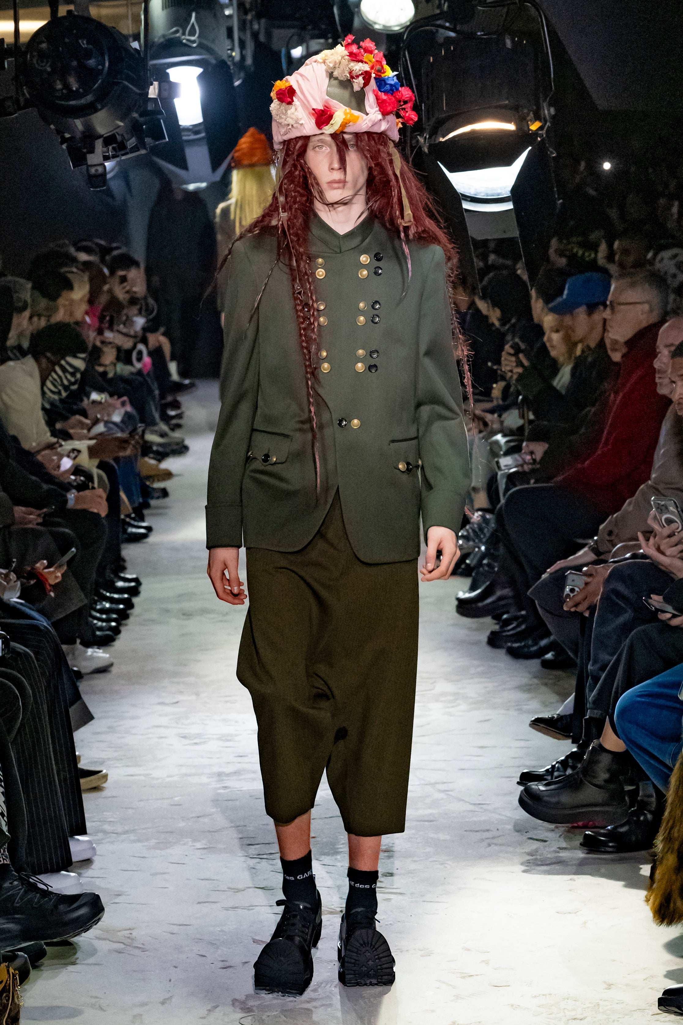 Fashion model wearing a Comme des Garçons Homme Plus AW25 outfit