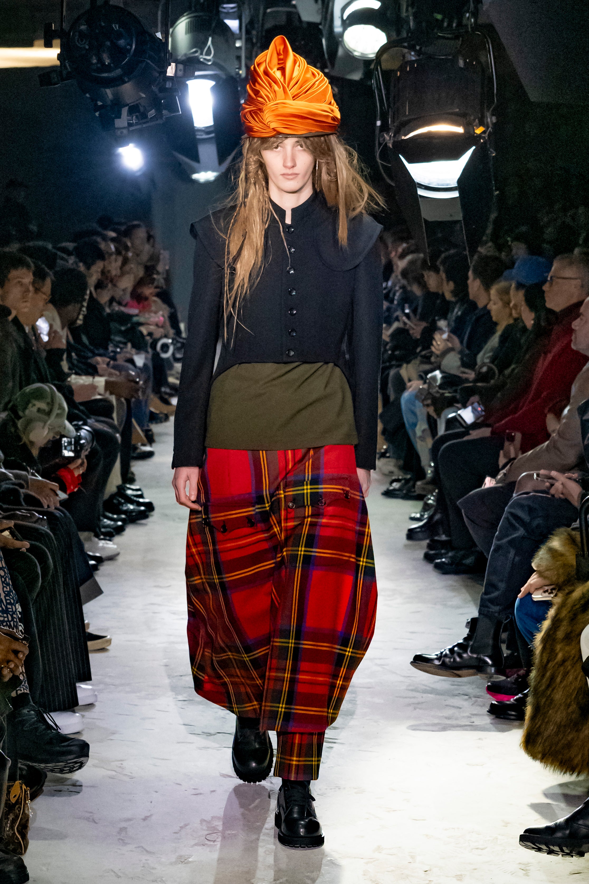 Fashion model wearing a Comme des Garçons Homme Plus AW25 outfit