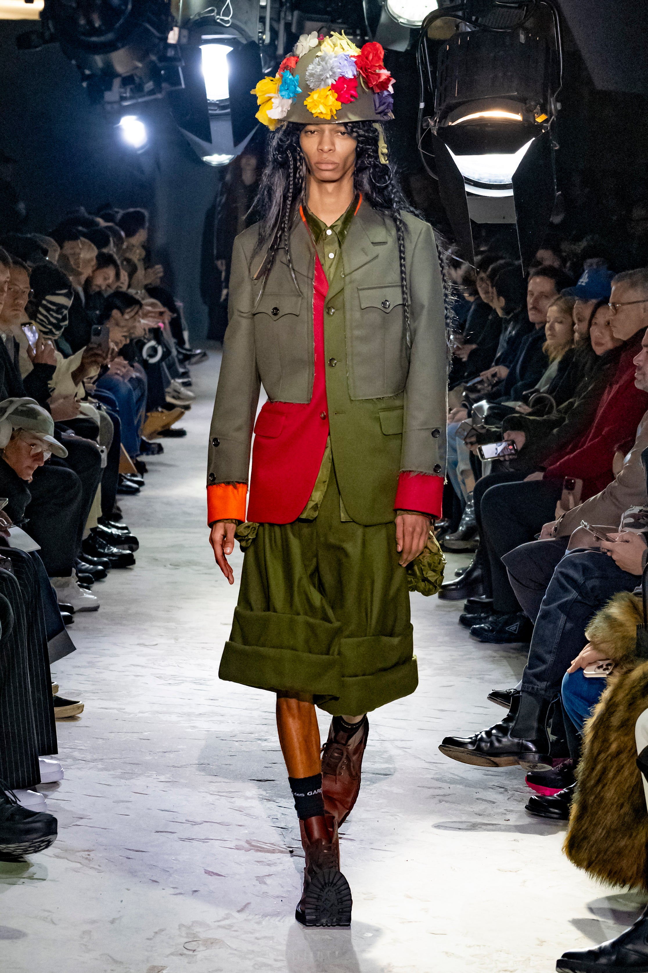 Fashion model wearing a Comme des Garçons Homme Plus AW25 outfit