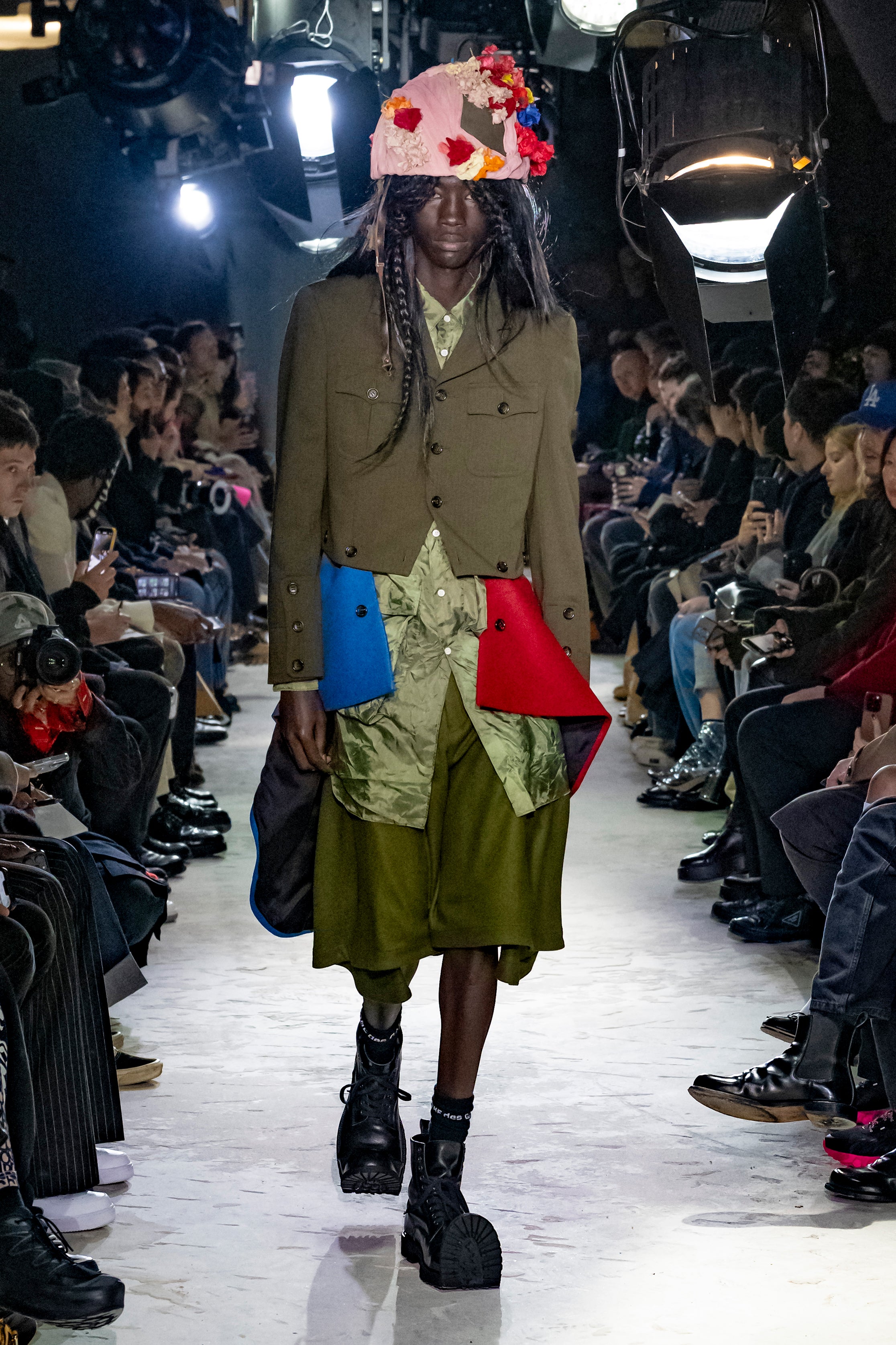 Fashion model wearing a Comme des Garçons Homme Plus AW25 outfit