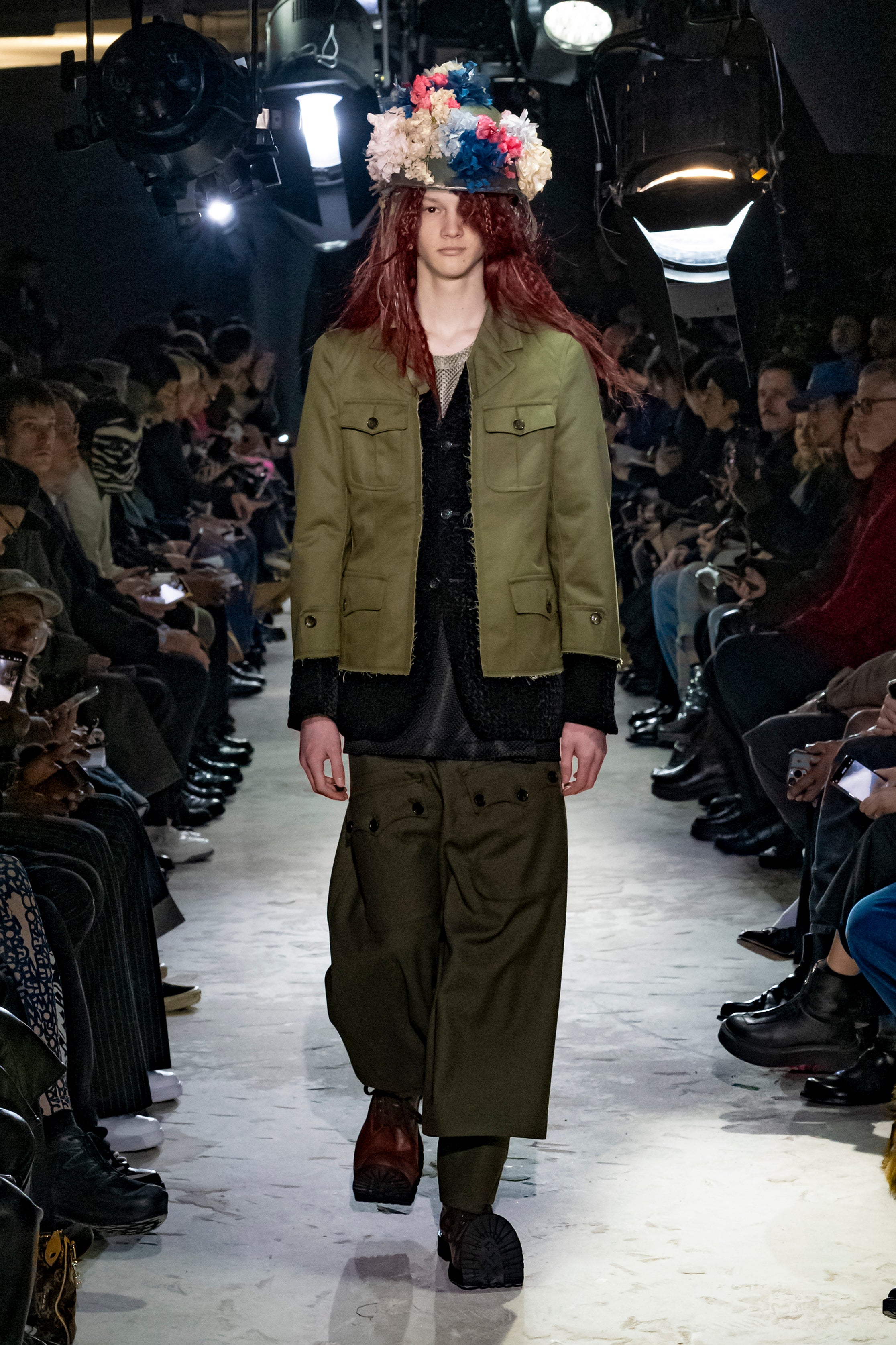 Fashion model wearing a Comme des Garçons Homme Plus AW25 outfit